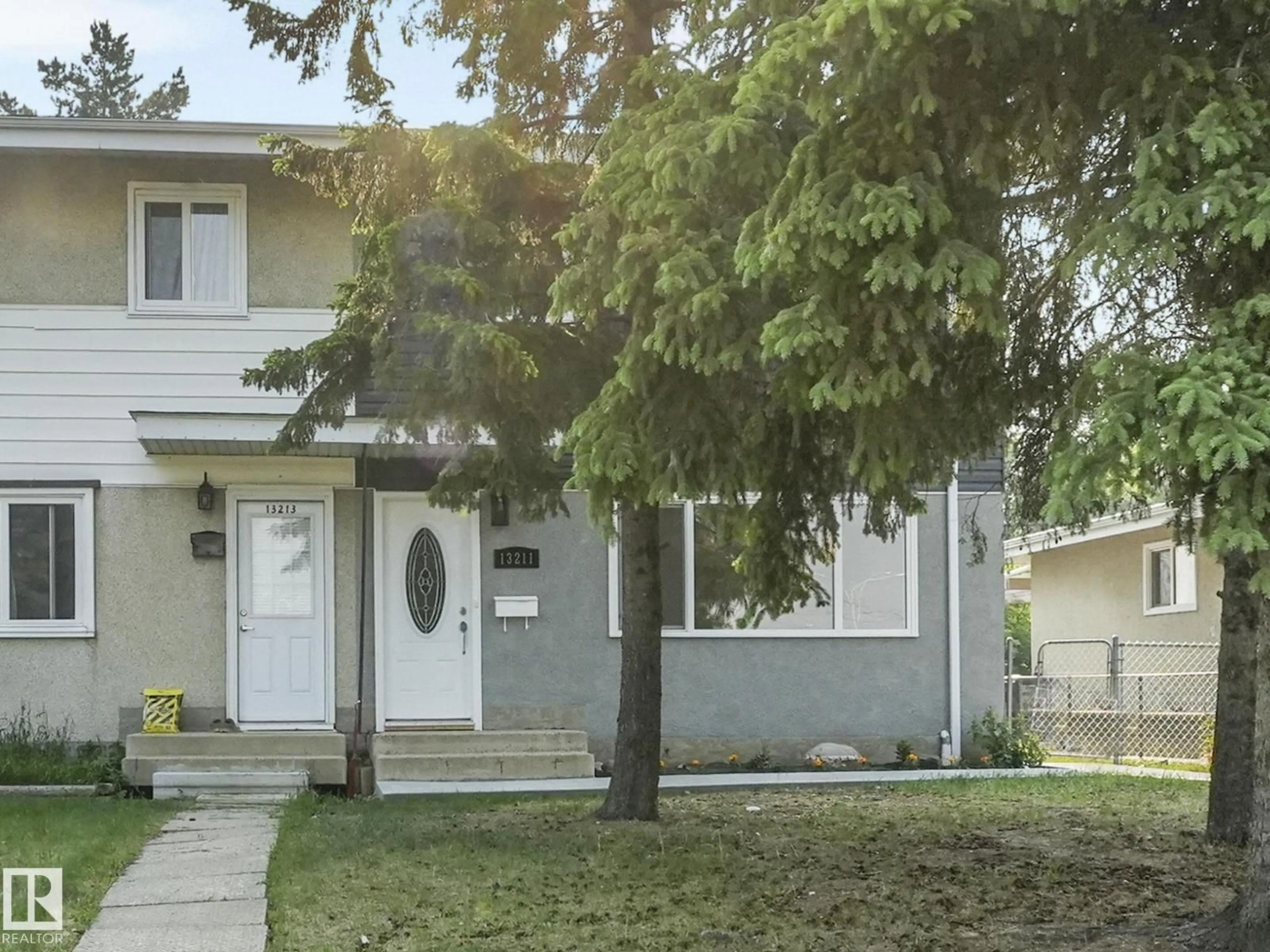 Home with vinyl exterior material, street for NW - 13211 95 ST, Edmonton Alberta T5E3Y2