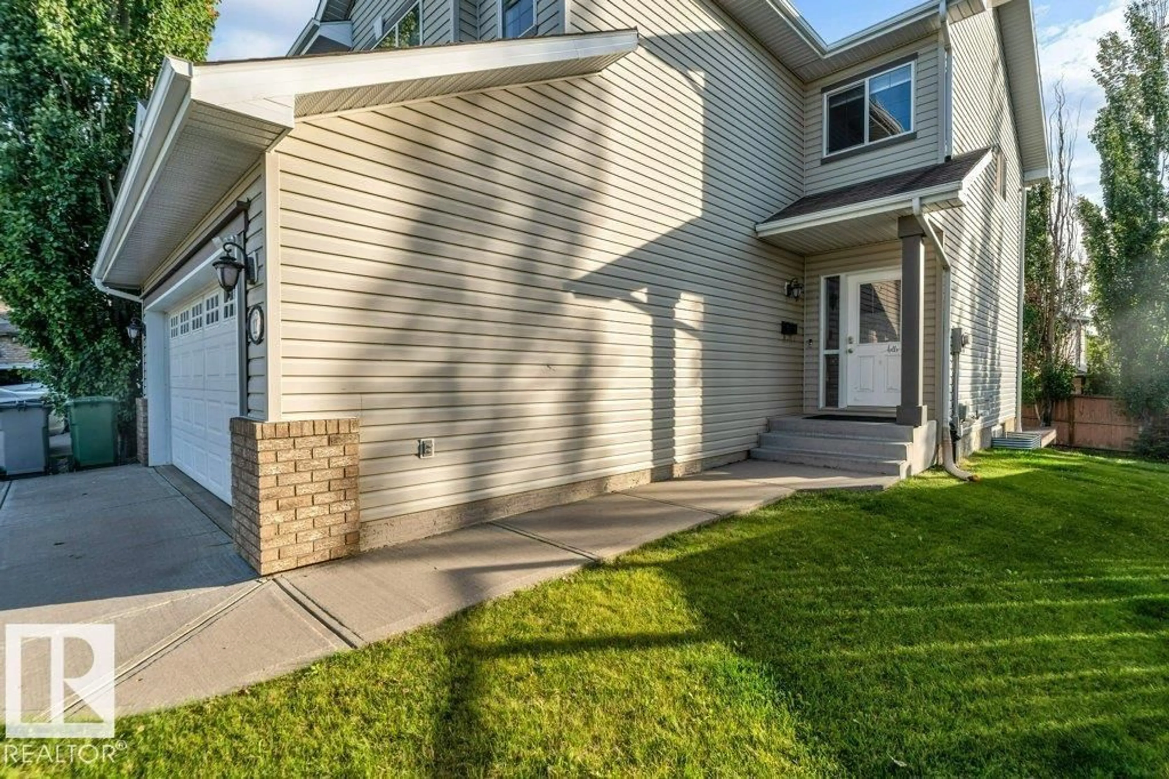 Home with vinyl exterior material, street for 123 CHAMPLAIN PL, Beaumont Alberta T4X1V9