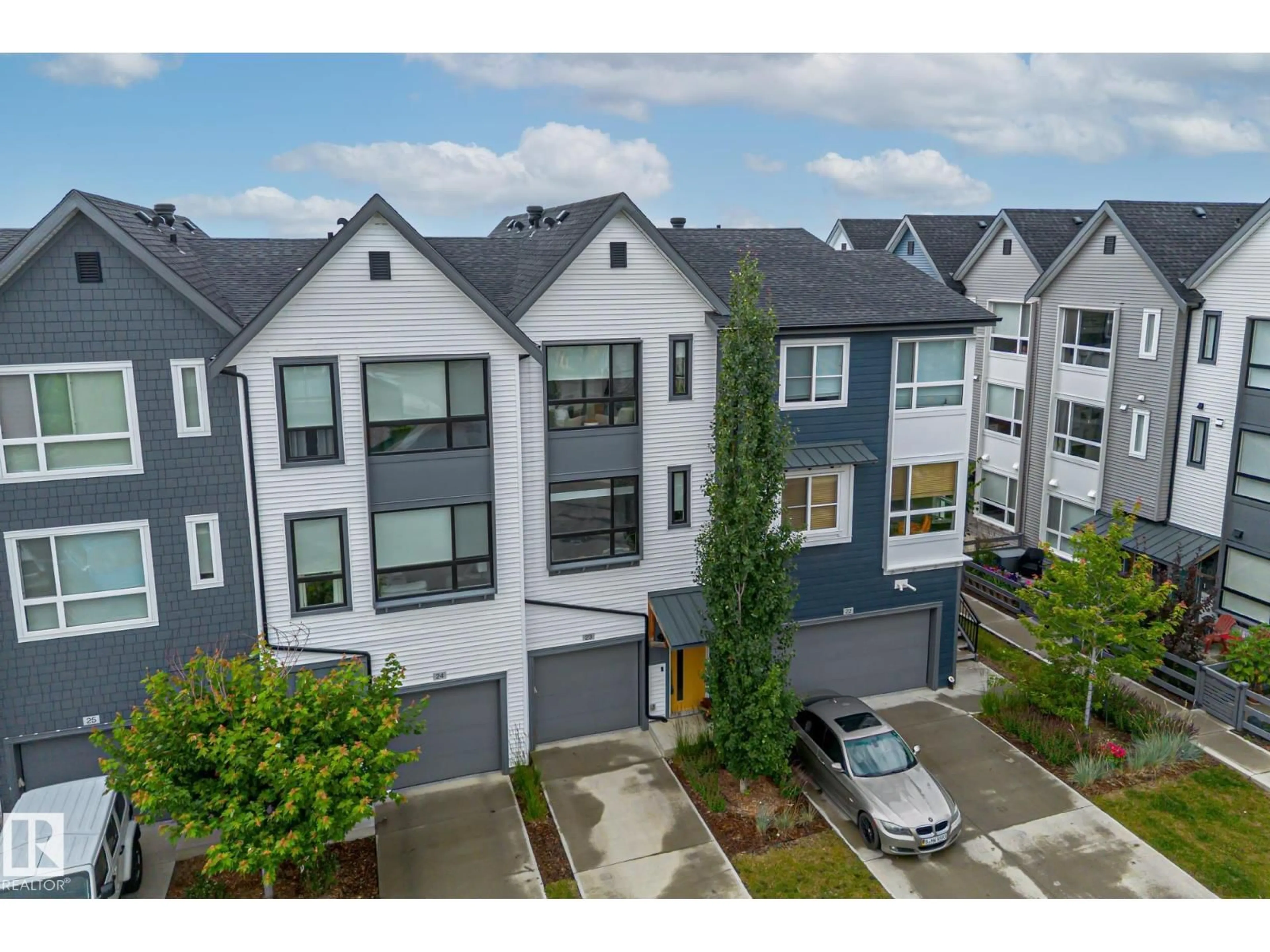 A pic from outside/outdoor area/front of a property/back of a property/a pic from drone, street for 100 JENSEN LAKES BV, St. Albert Alberta T8N7T9