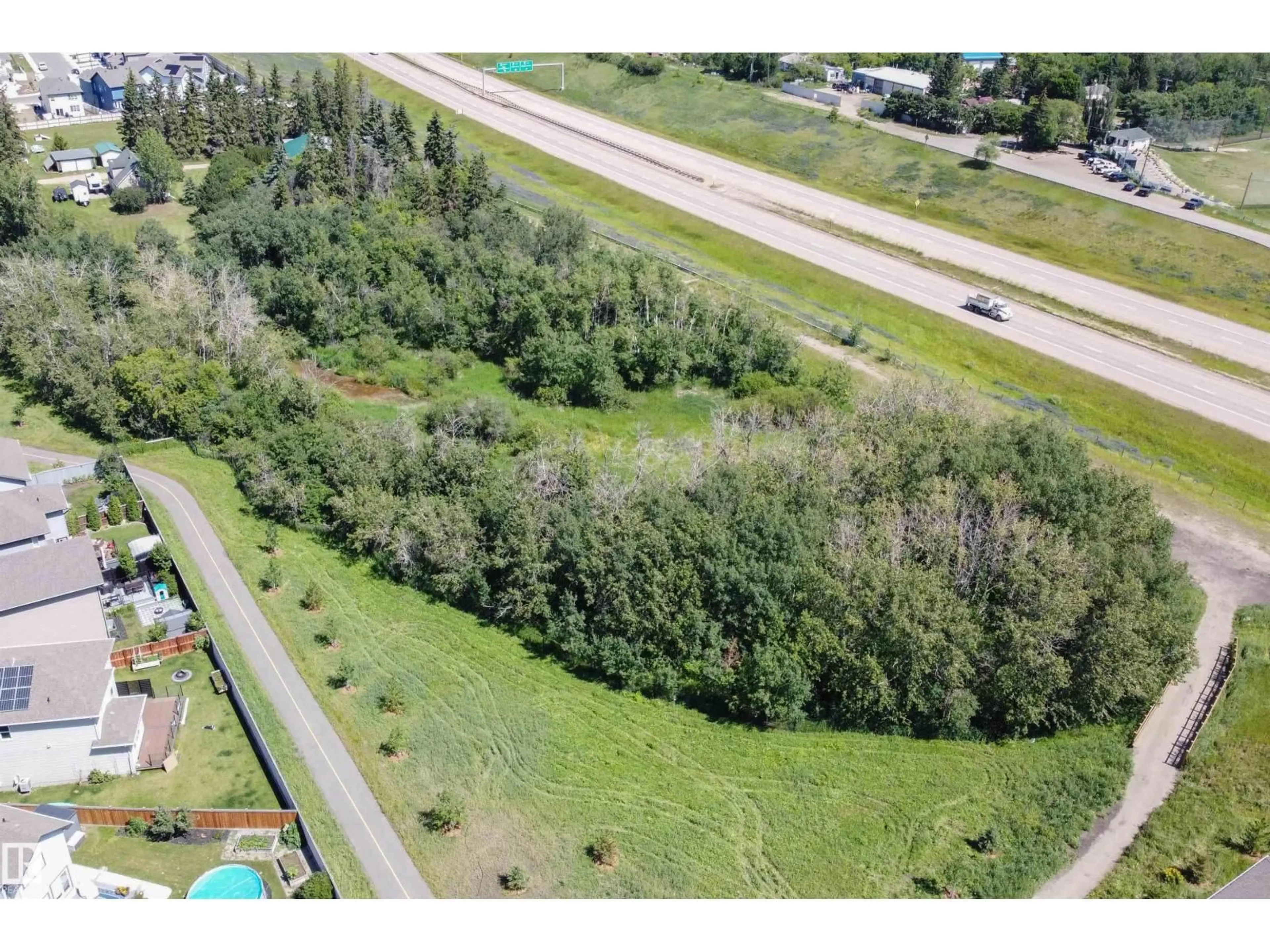 A pic from outside/outdoor area/front of a property/back of a property/a pic from drone, forest/trees view for 17 SUNBURY PL, Sherwood Park Alberta T8H0K3