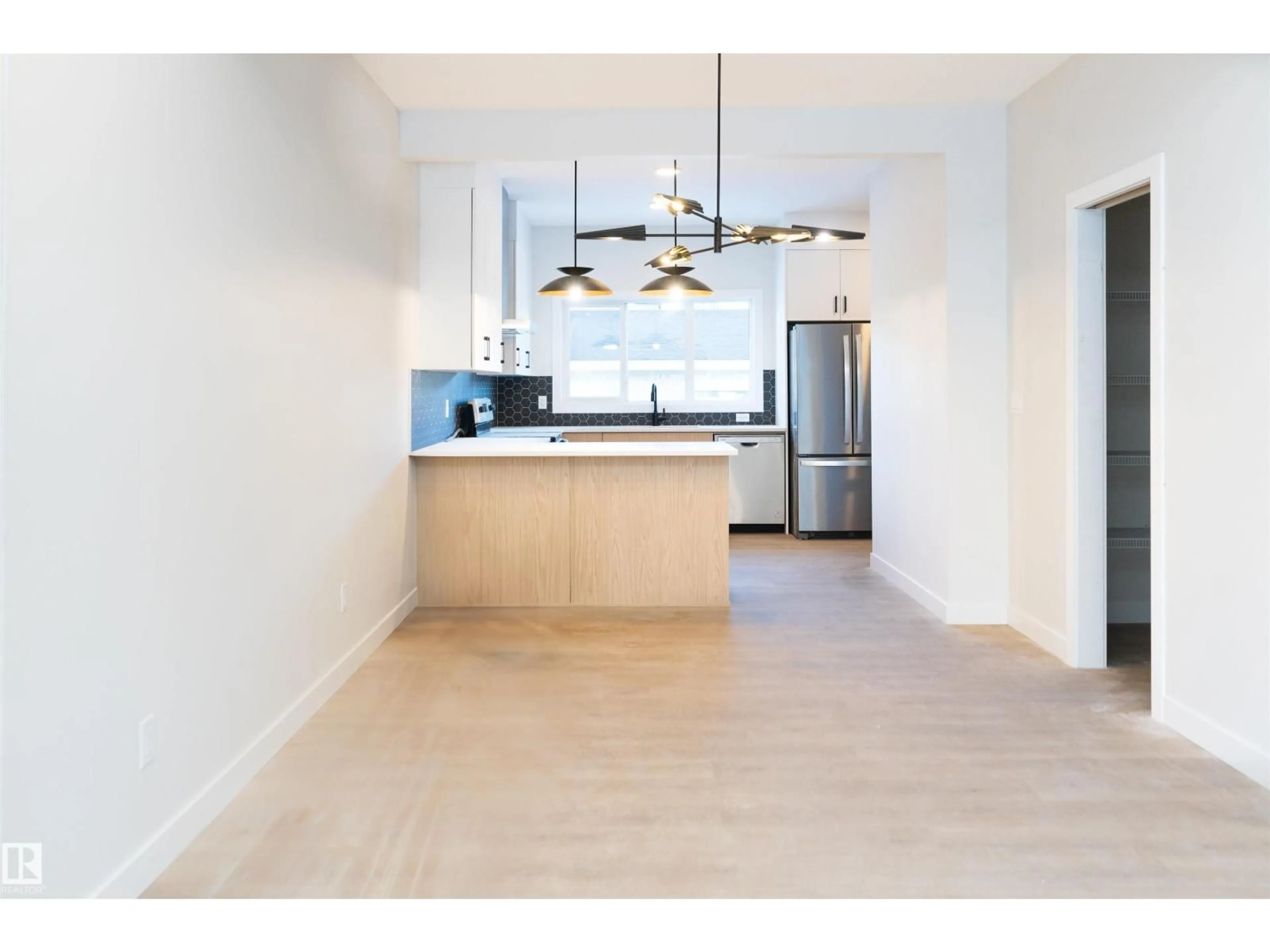 Open concept kitchen, ceramic/tile floor for 5111 PILOT LN, Edmonton Alberta T5G2S5