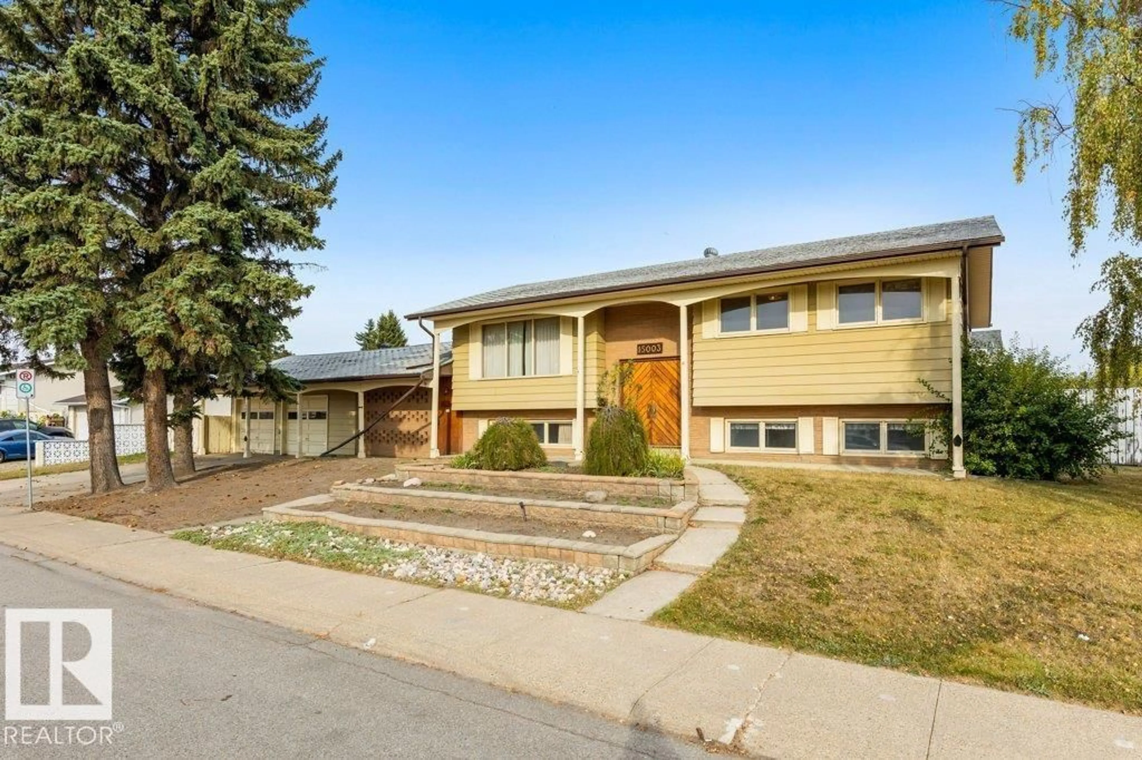 Home with vinyl exterior material, street for 15003 88 ST, Edmonton Alberta T5E5F9