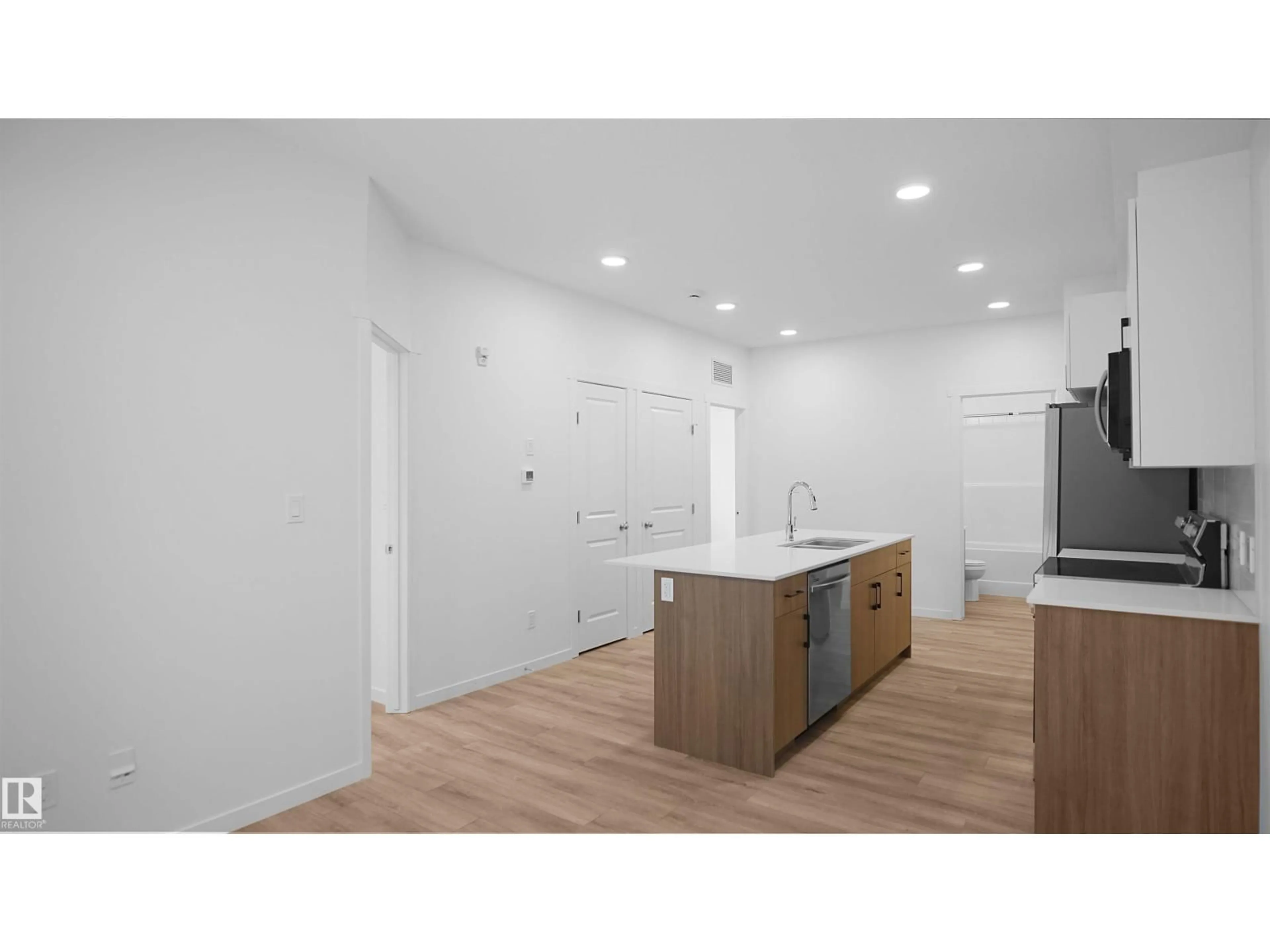 Open concept kitchen, unknown for #103 - 9215 228 ST, Edmonton Alberta T5T7R9