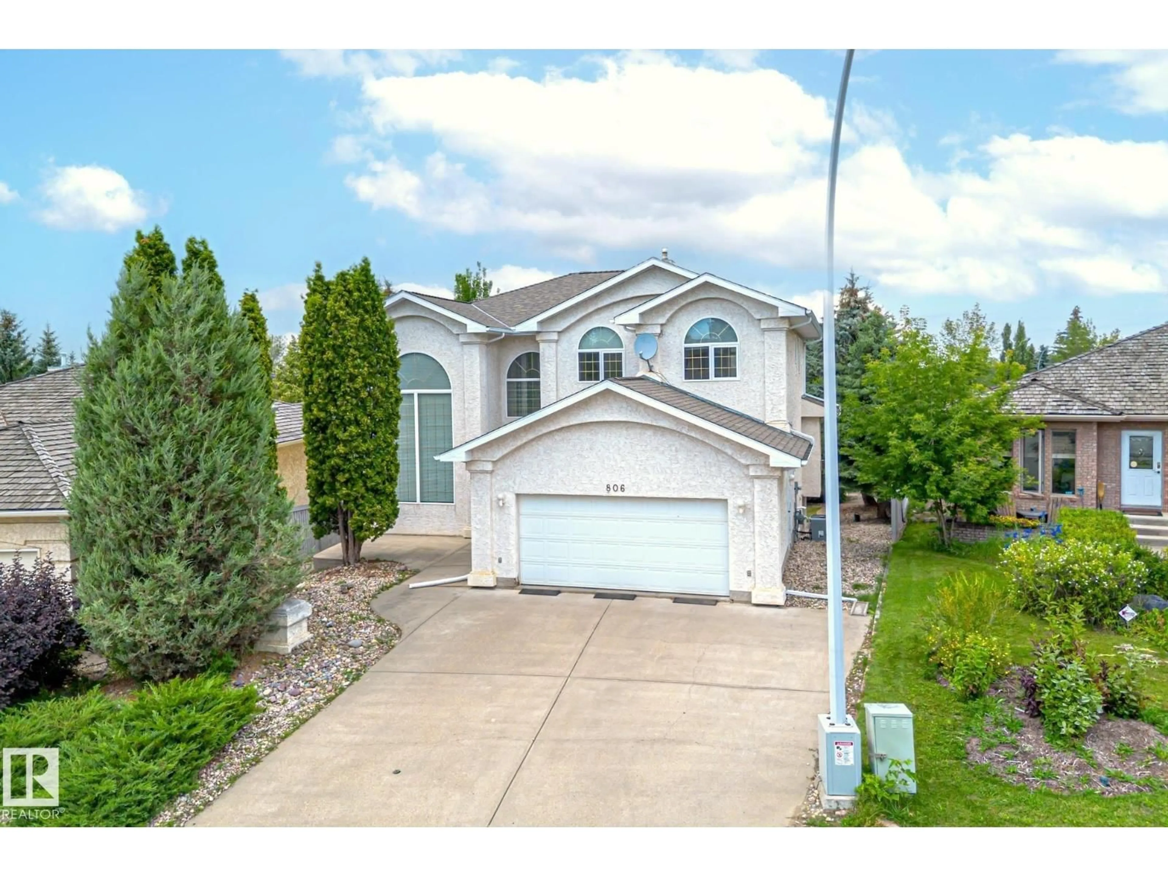 Home with vinyl exterior material, street for 806 REID PL, Edmonton Alberta T6R2B9
