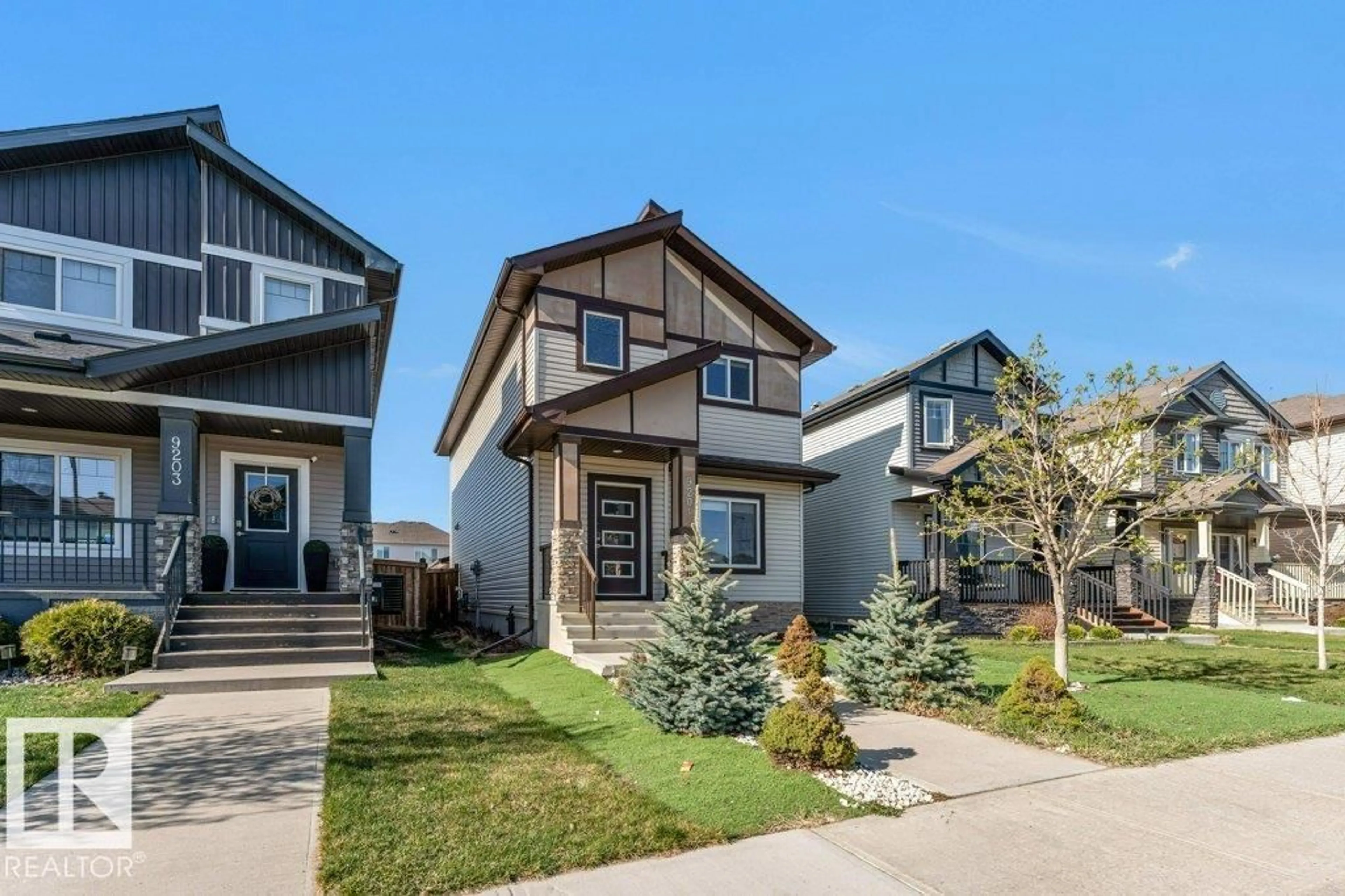 Home with vinyl exterior material, street for 9201 COOPER CR, Edmonton Alberta T6W3L1