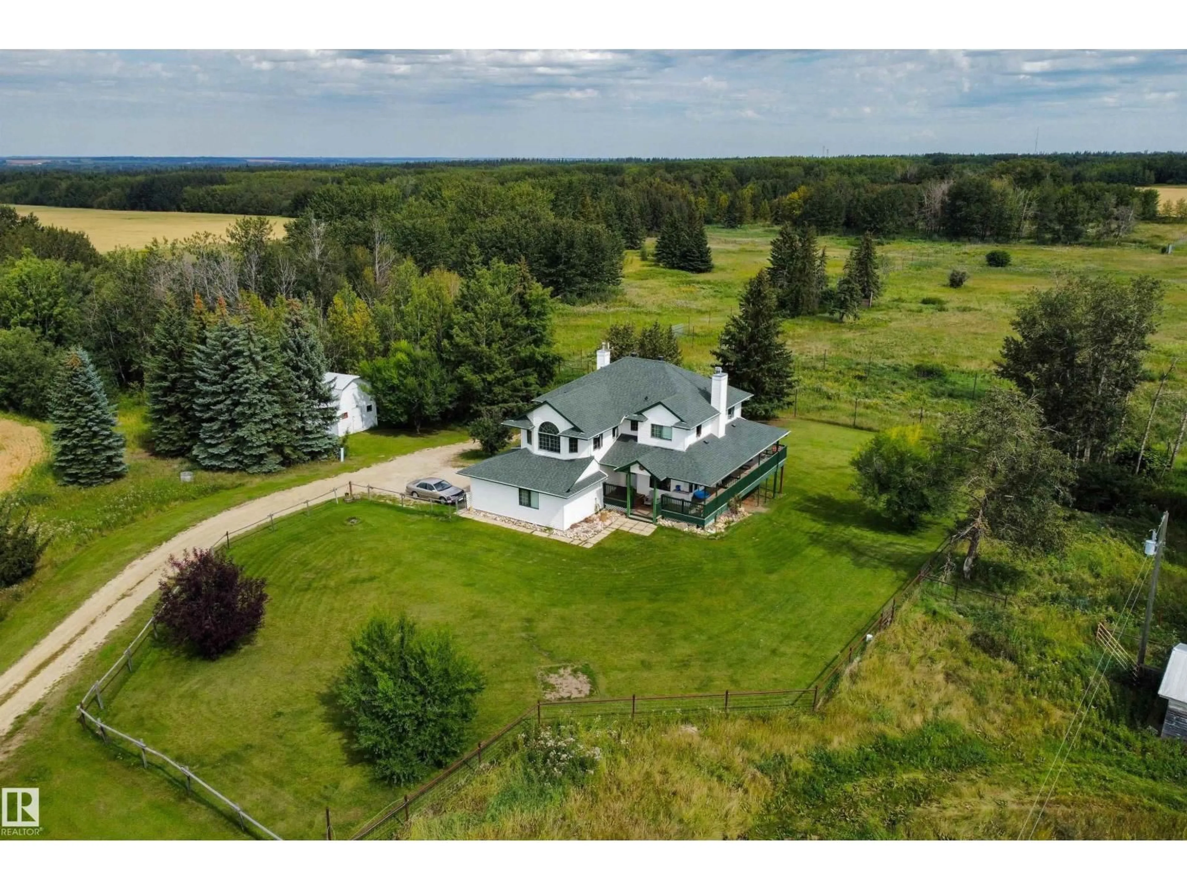 A pic from outside/outdoor area/front of a property/back of a property/a pic from drone, unknown for 10911A ATIM RD, Rural Parkland County Alberta T7X6L9