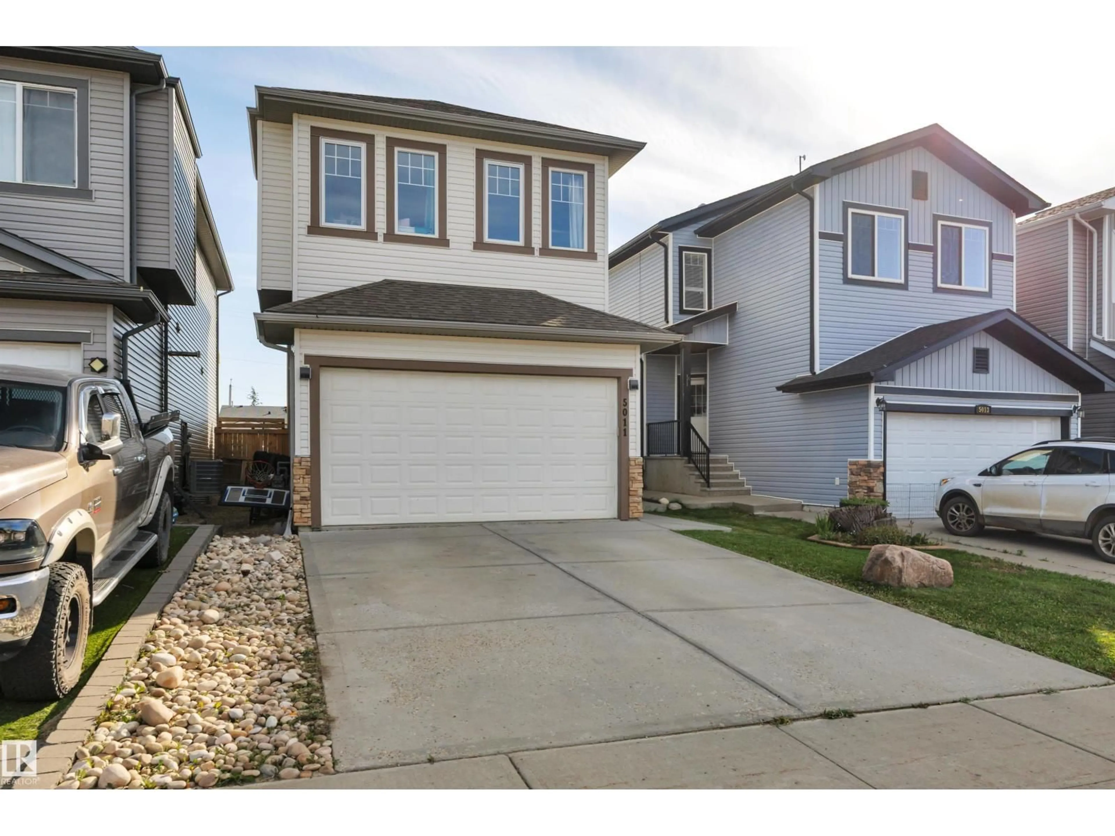 Home with vinyl exterior material, street for 5011 53 AV, Calmar Alberta T0C0V0