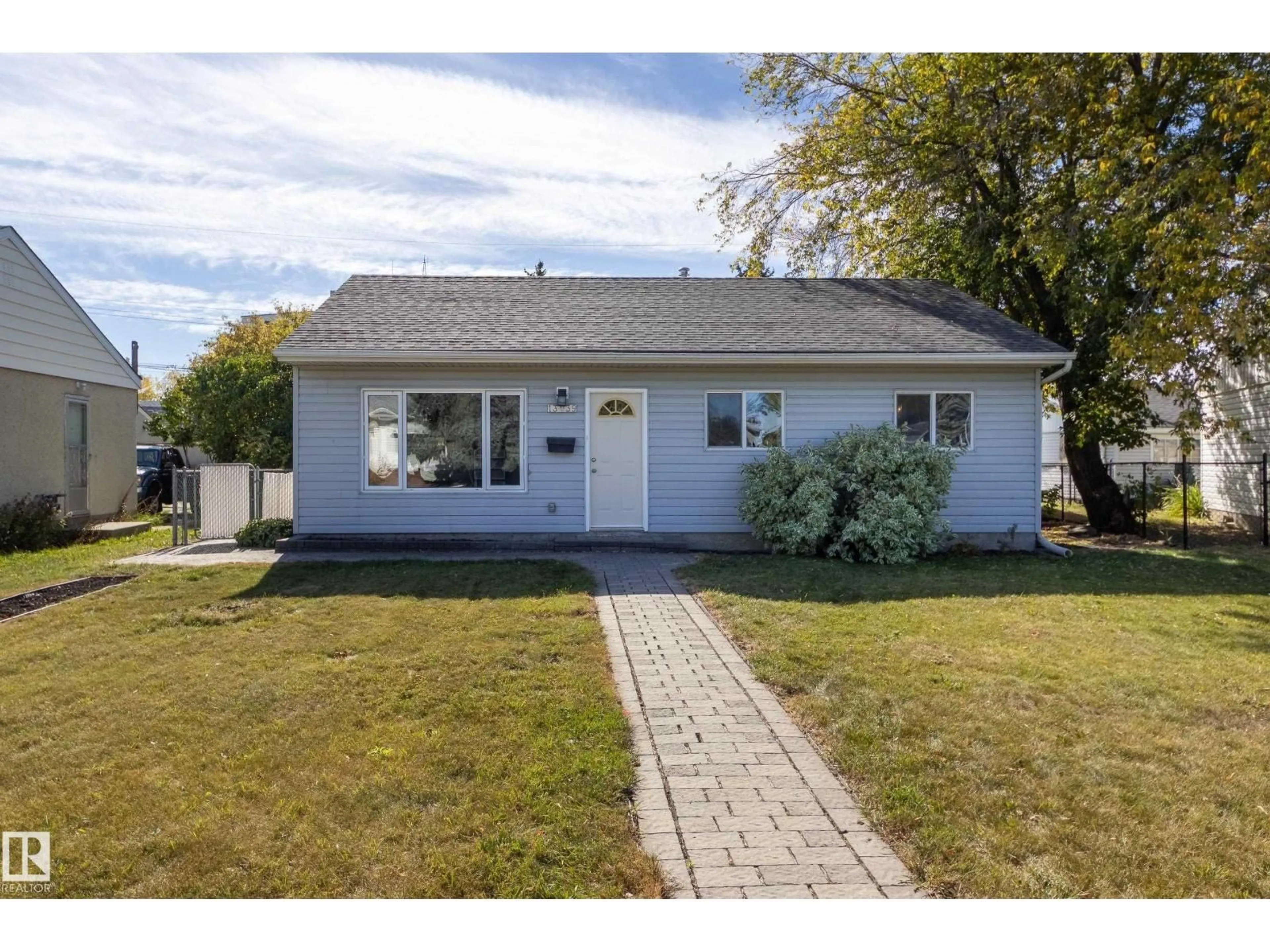 Home with vinyl exterior material, street for 13039 128A AV, Edmonton Alberta T5L3H8