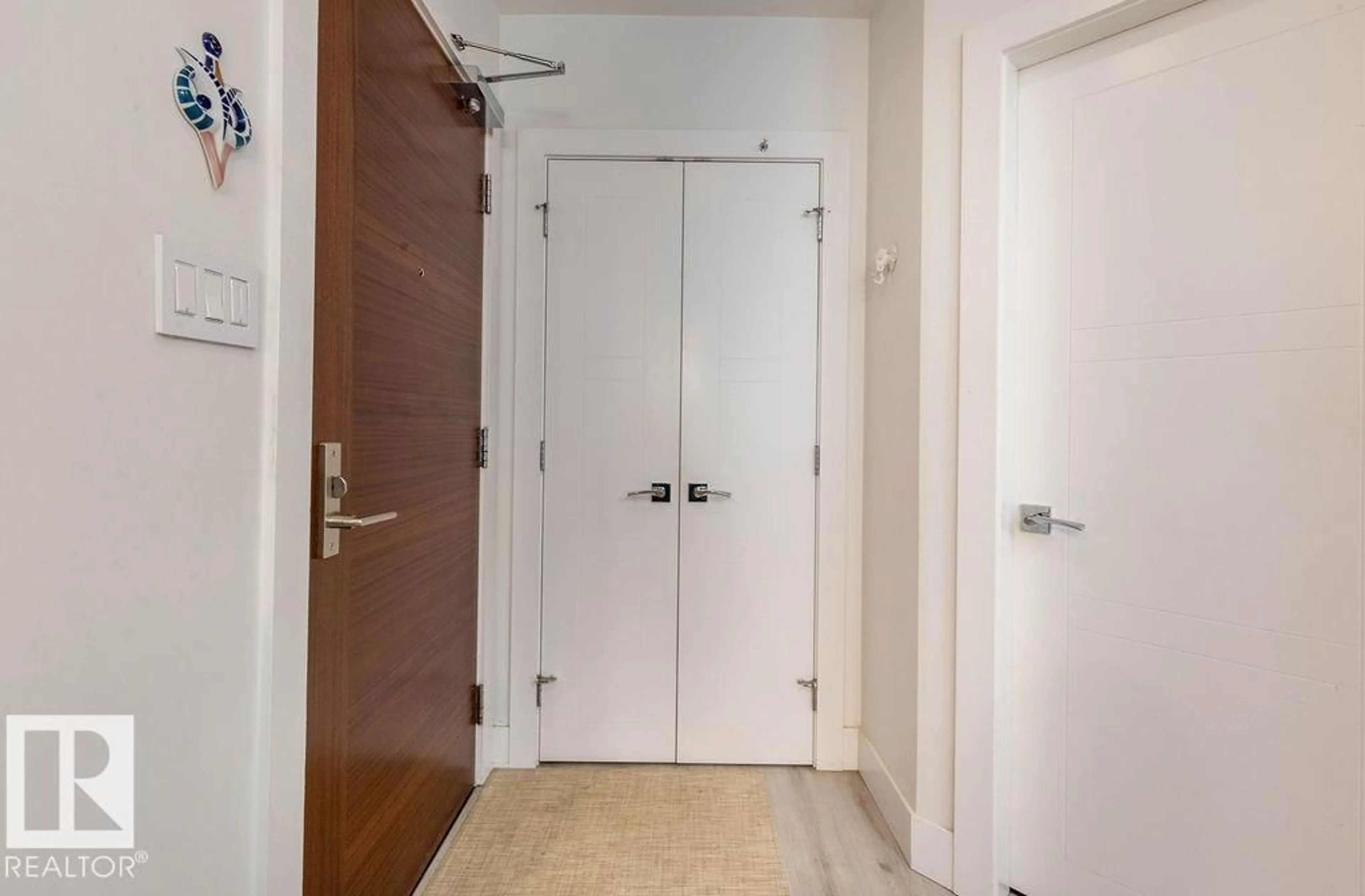 Indoor foyer for 206 - 11969 JASPER AV NW, Edmonton Alberta T5K0P1