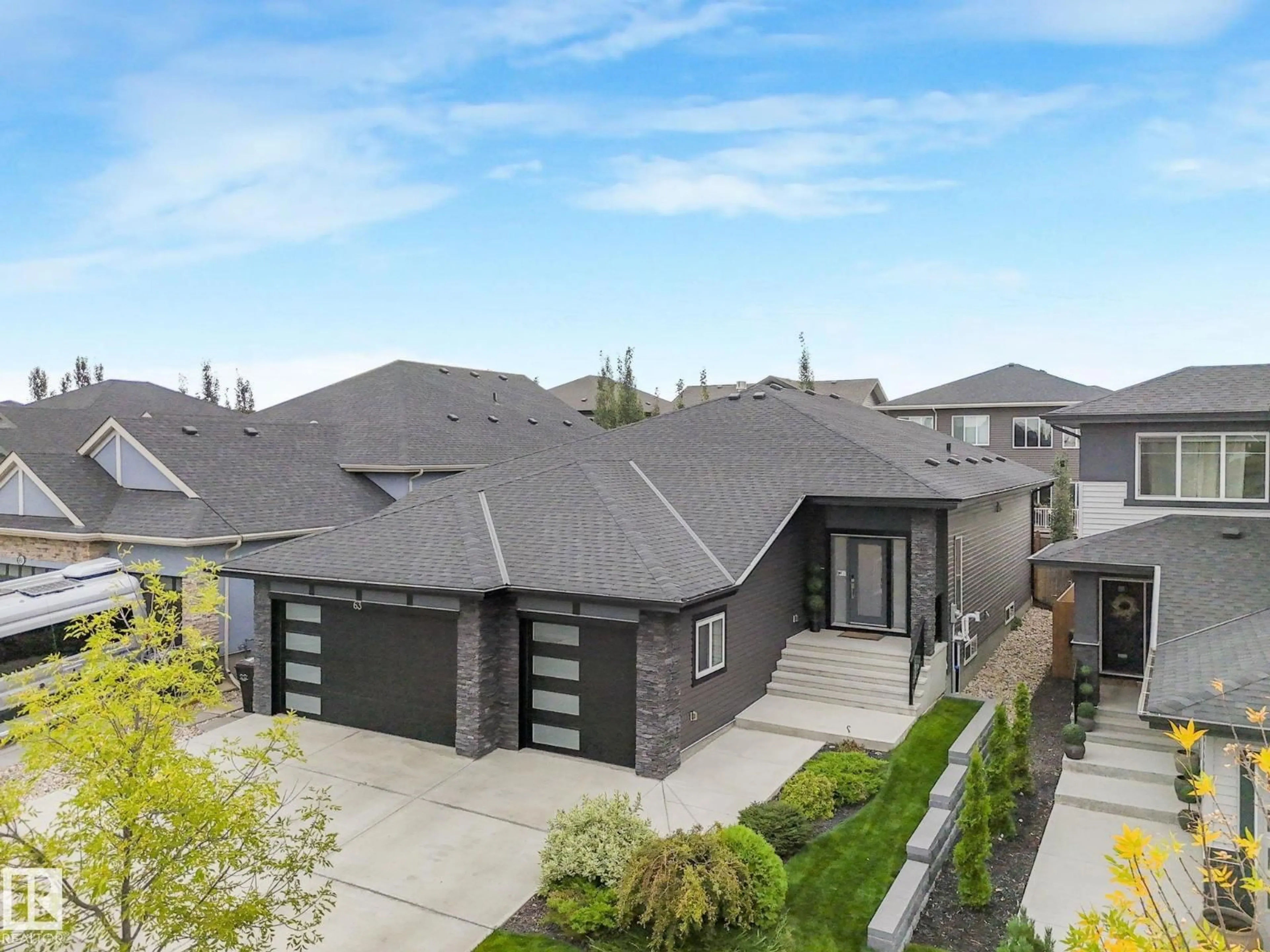 Home with brick exterior material, street for 63 WOODS PL, Leduc Alberta T9E0N7