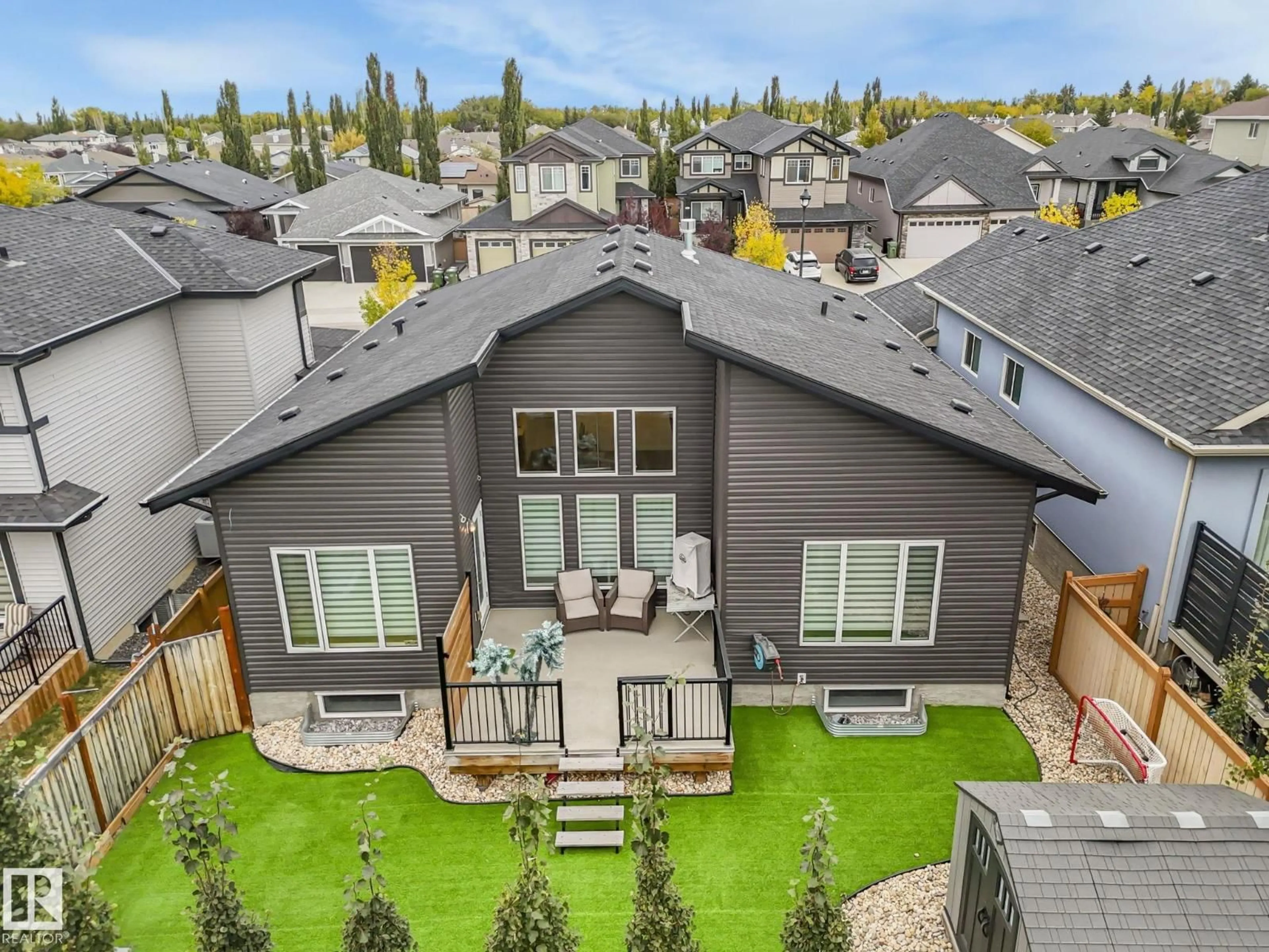 A pic from outside/outdoor area/front of a property/back of a property/a pic from drone, mountain view for 63 WOODS PL, Leduc Alberta T9E0N7