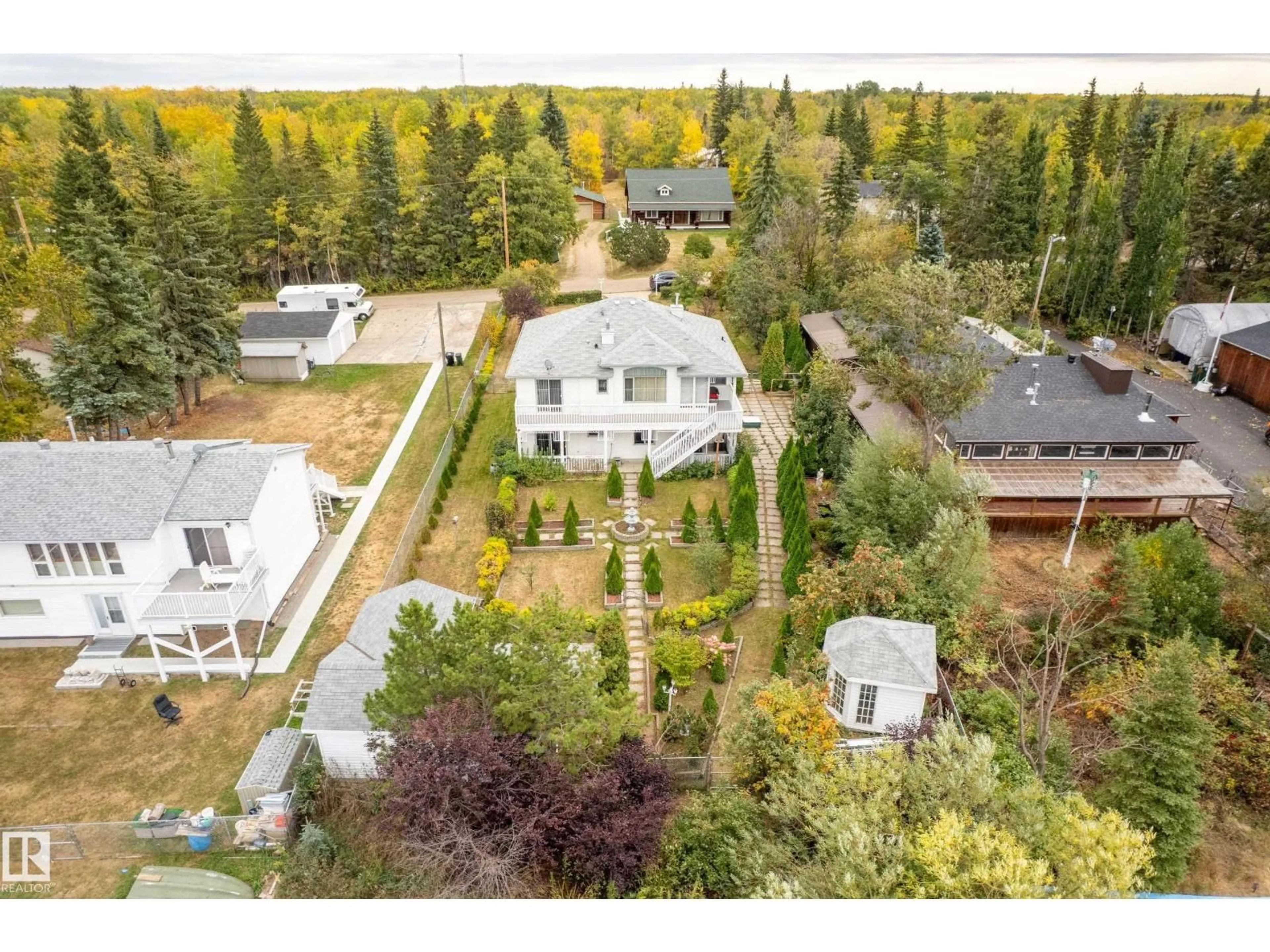 A pic from outside/outdoor area/front of a property/back of a property/a pic from drone, street for 76 - 52343 RGE ROAD 211, Rural Strathcona County Alberta T8G1A6
