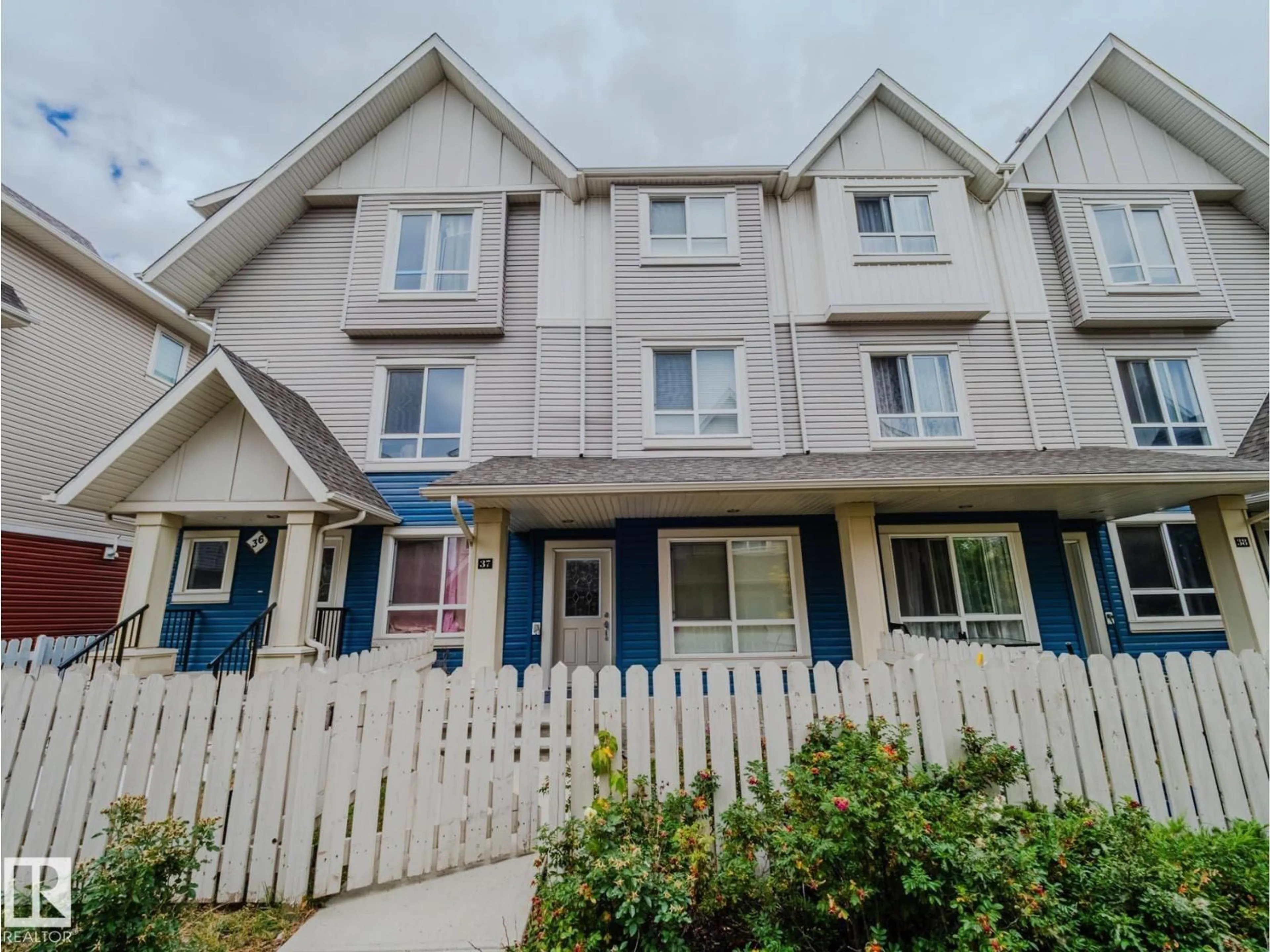 A pic from outside/outdoor area/front of a property/back of a property/a pic from drone, street for #37 - 13003 132 AV, Edmonton Alberta T5L3R2
