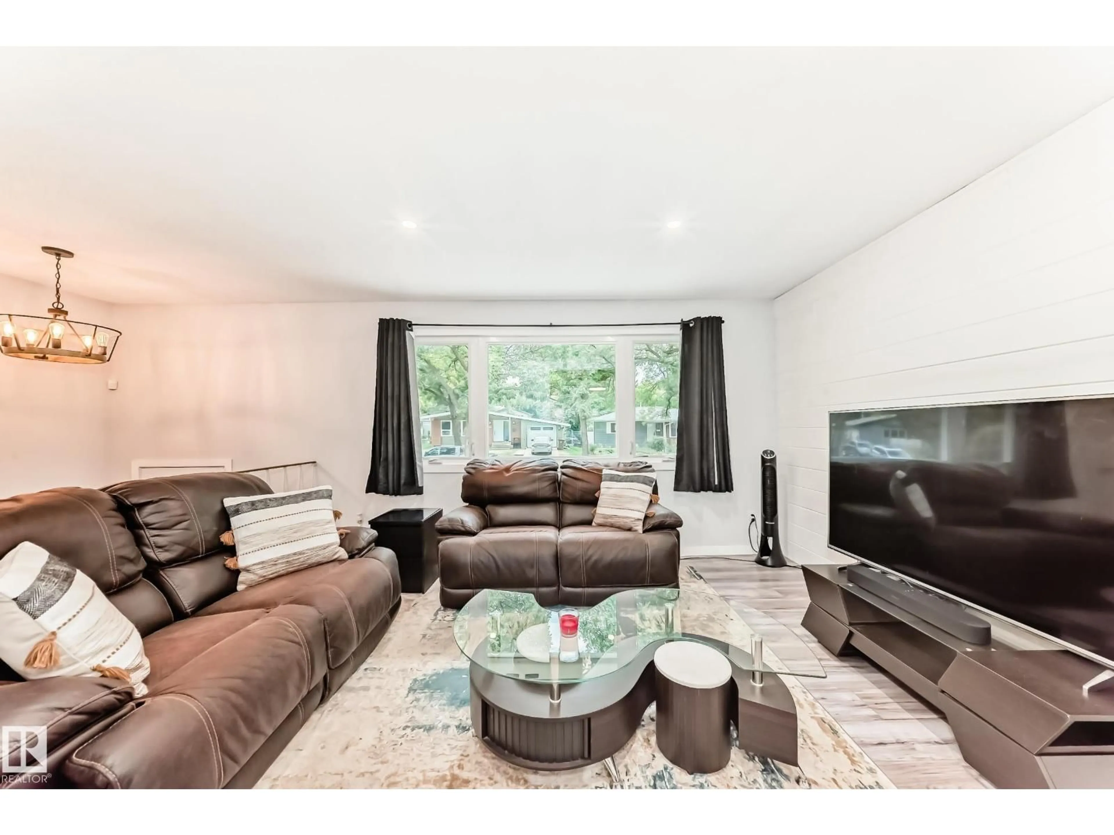 Living room with furniture, wood/laminate floor for 6 BEACON CR, St. Albert Alberta T8N0A3