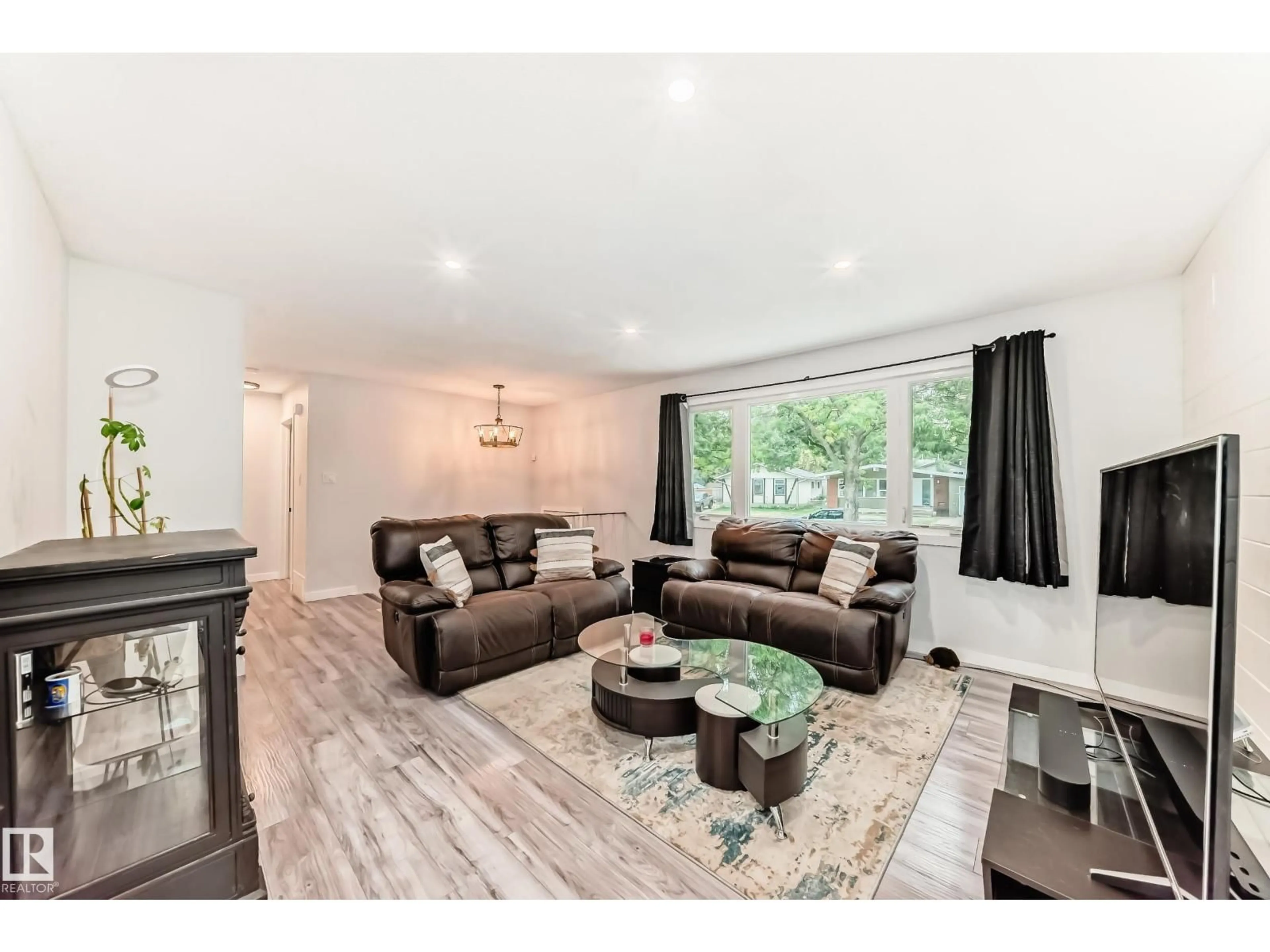 Living room with furniture, wood/laminate floor for 6 BEACON CR, St. Albert Alberta T8N0A3