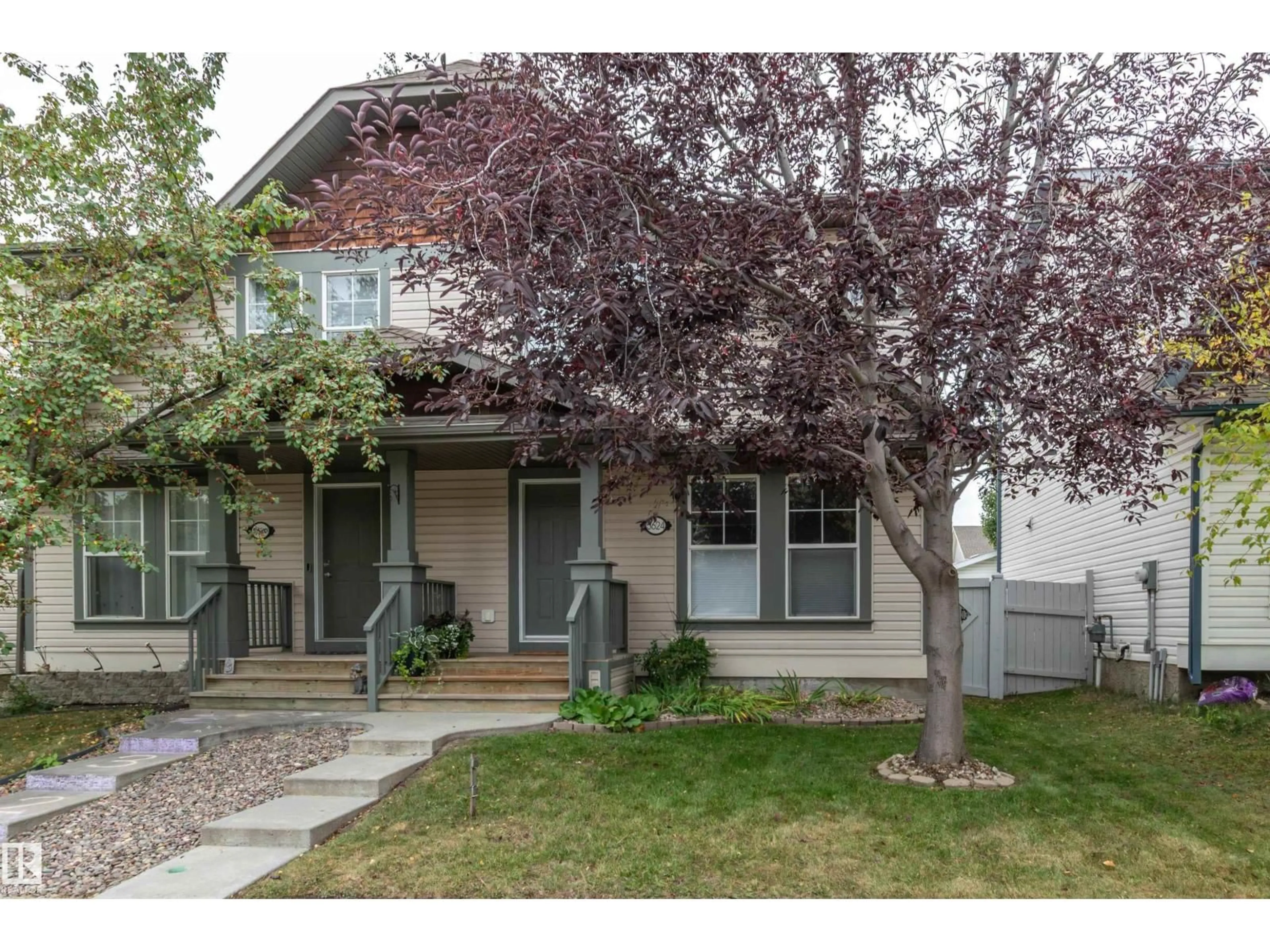 Home with vinyl exterior material, street for NW - 5624 202 ST, Edmonton Alberta T6M0B3