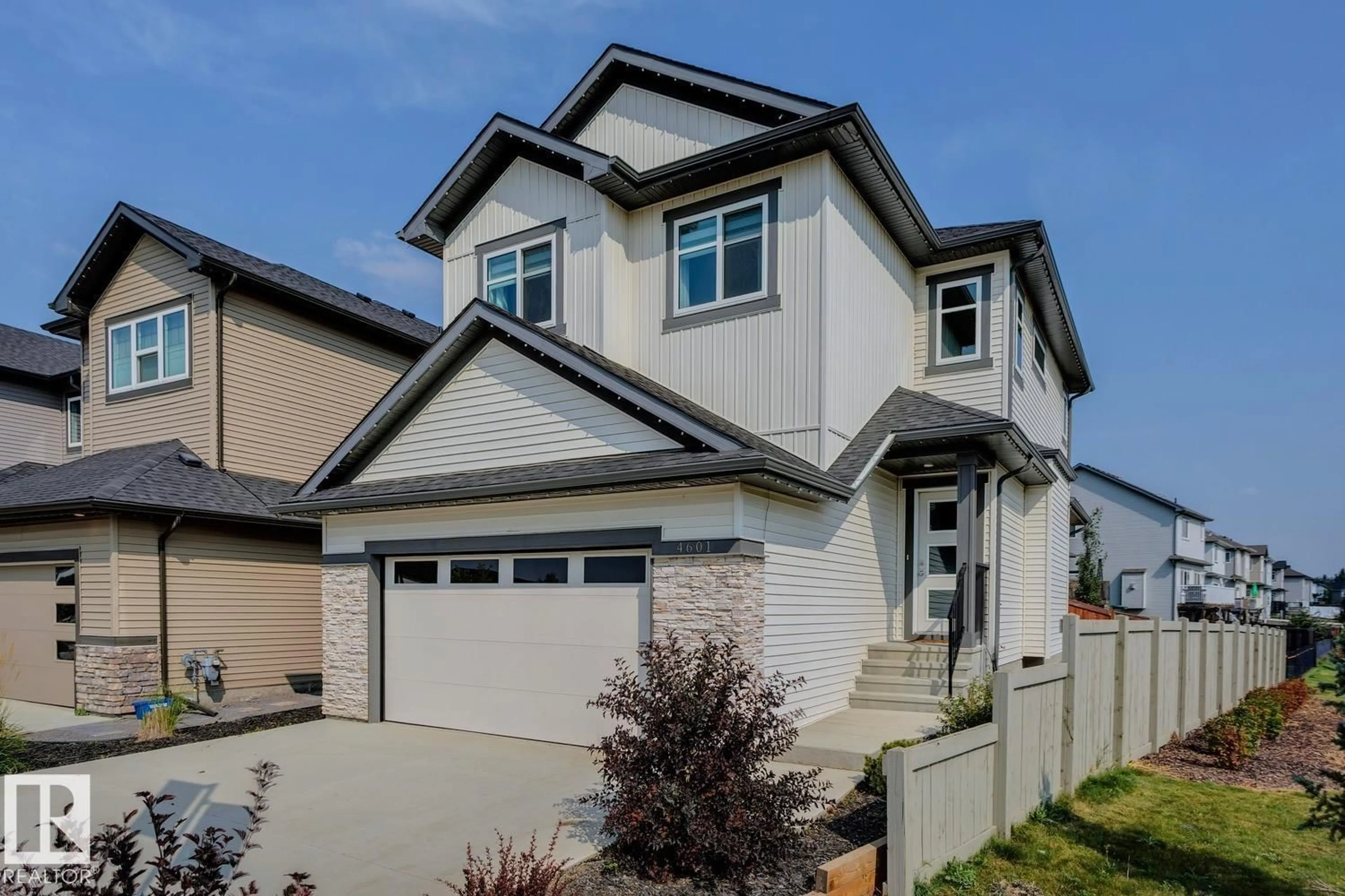 Home with vinyl exterior material, street for 4601 - 4601 66 ST, Beaumont Alberta T4X2X5