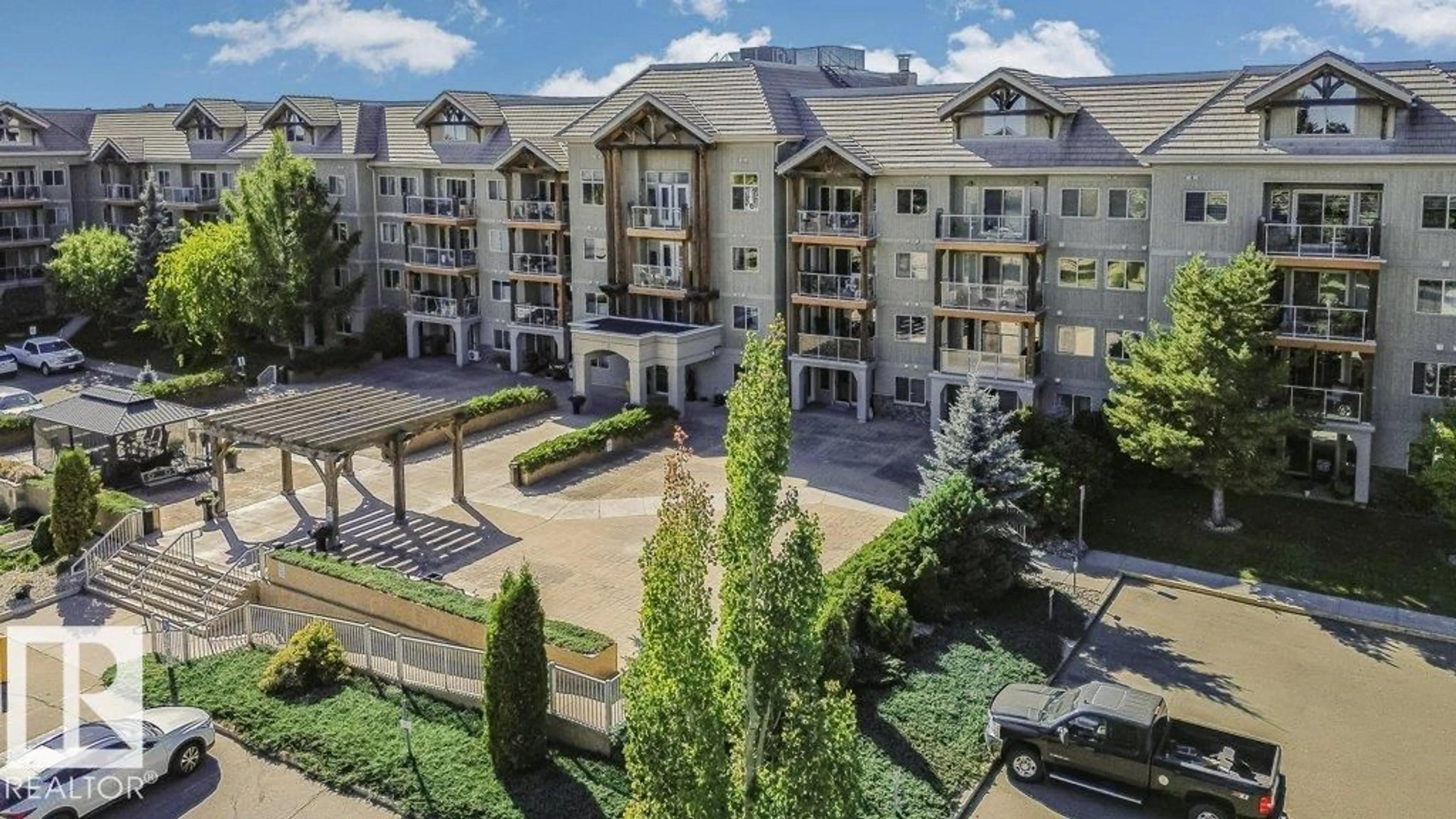 A pic from outside/outdoor area/front of a property/back of a property/a pic from drone, city buildings view from balcony for #202 - 278 SUDER GREENS DR, Edmonton Alberta T5T6V6