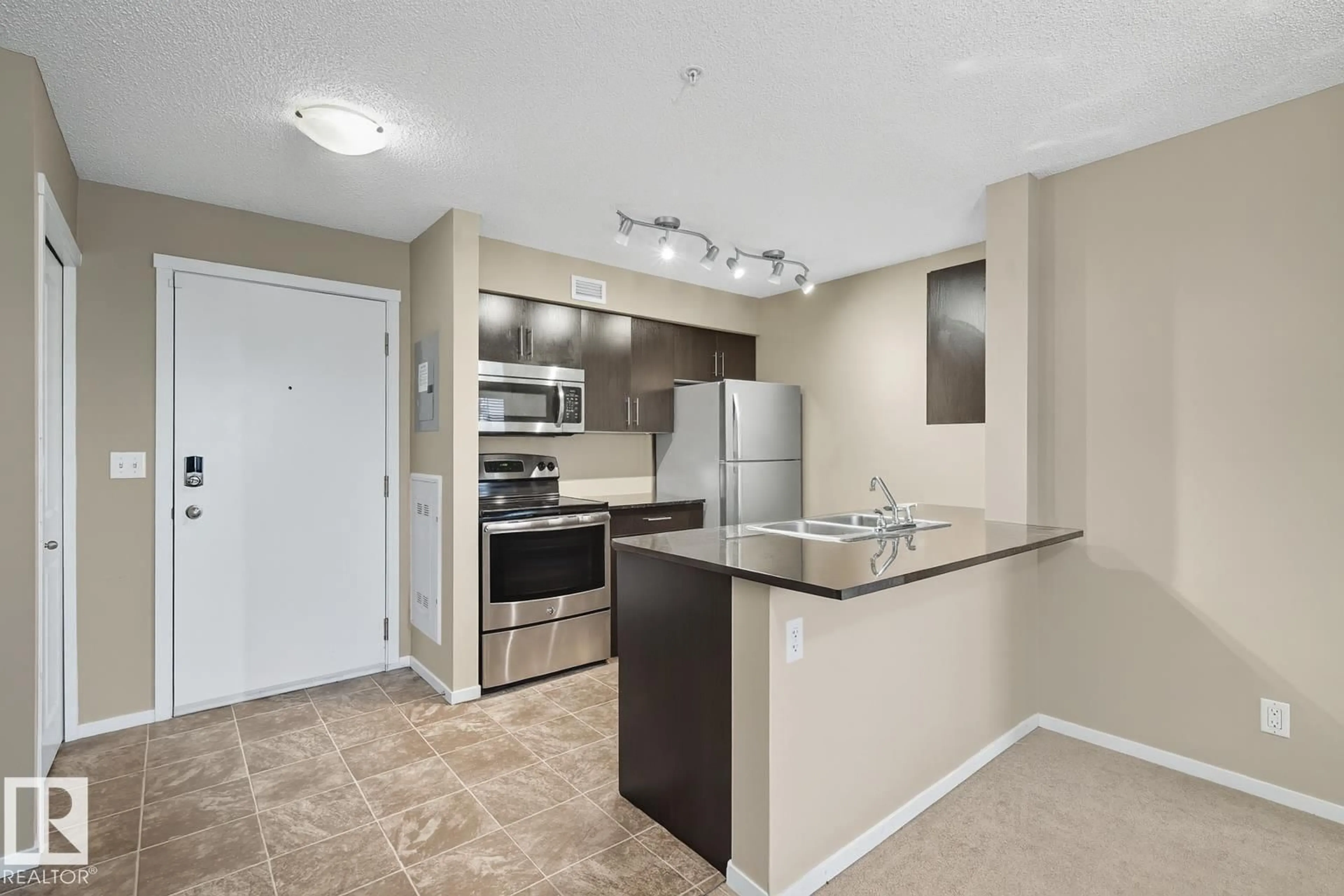Standard kitchen, unknown for #205 - 5810 MULLEN PL, Edmonton Alberta T6R0W3
