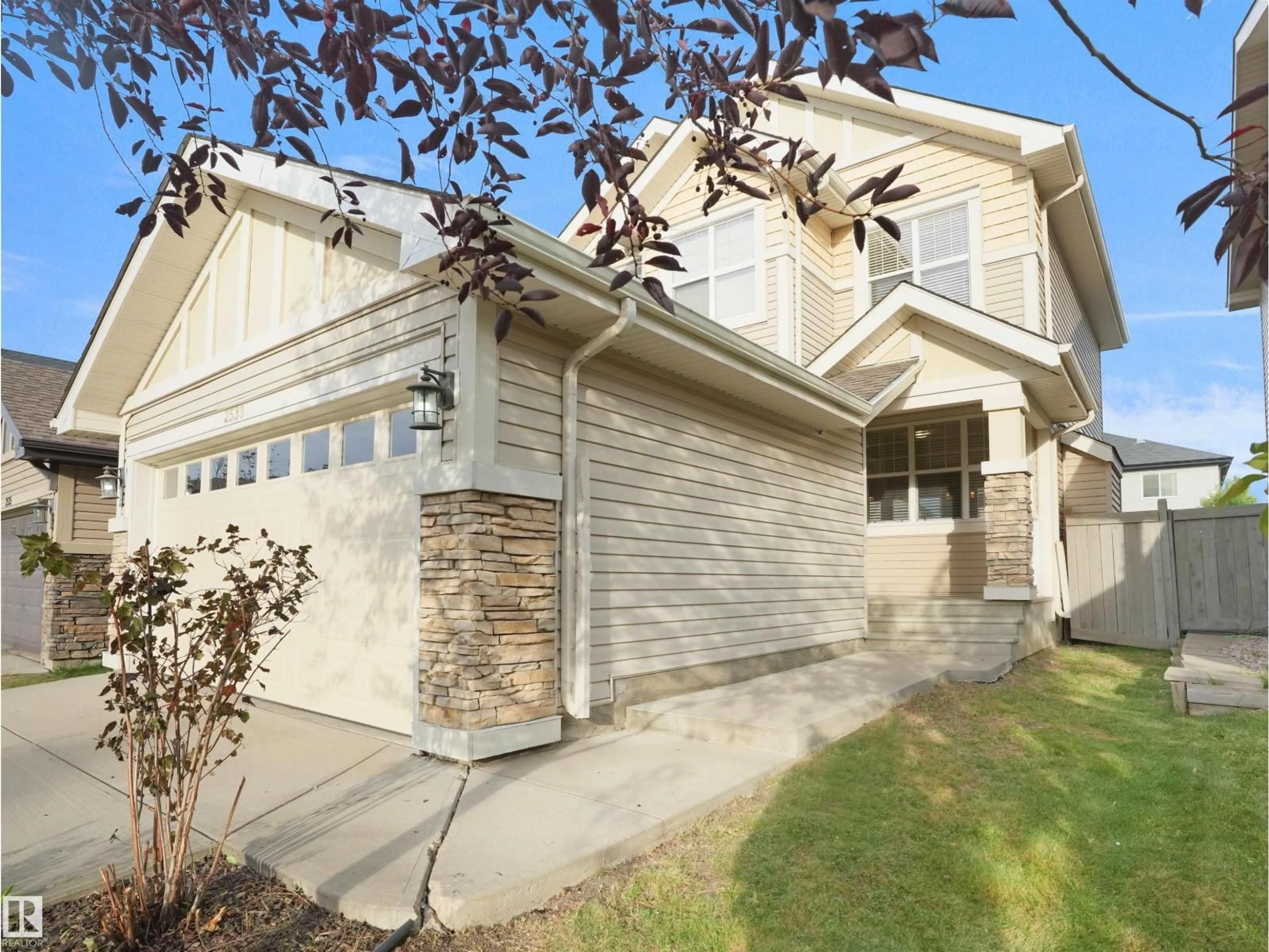 Home with vinyl exterior material, street for 2533 COLE CR, Edmonton Alberta T6W2A3
