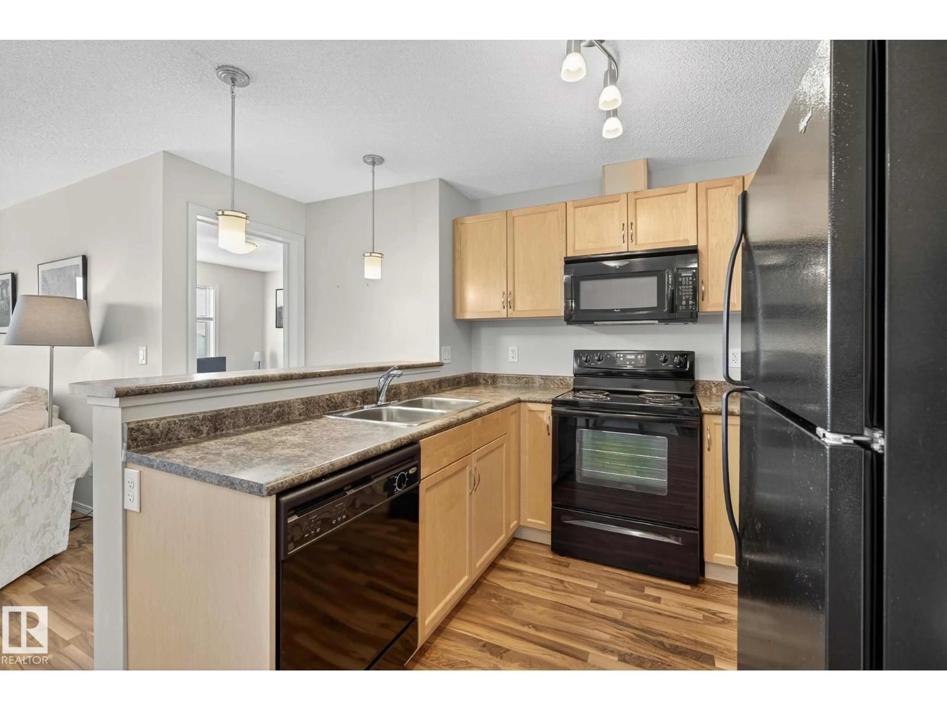 Standard kitchen, unknown for 310 - 6070 SCHONSEE WY, Edmonton Alberta T5Z0G8
