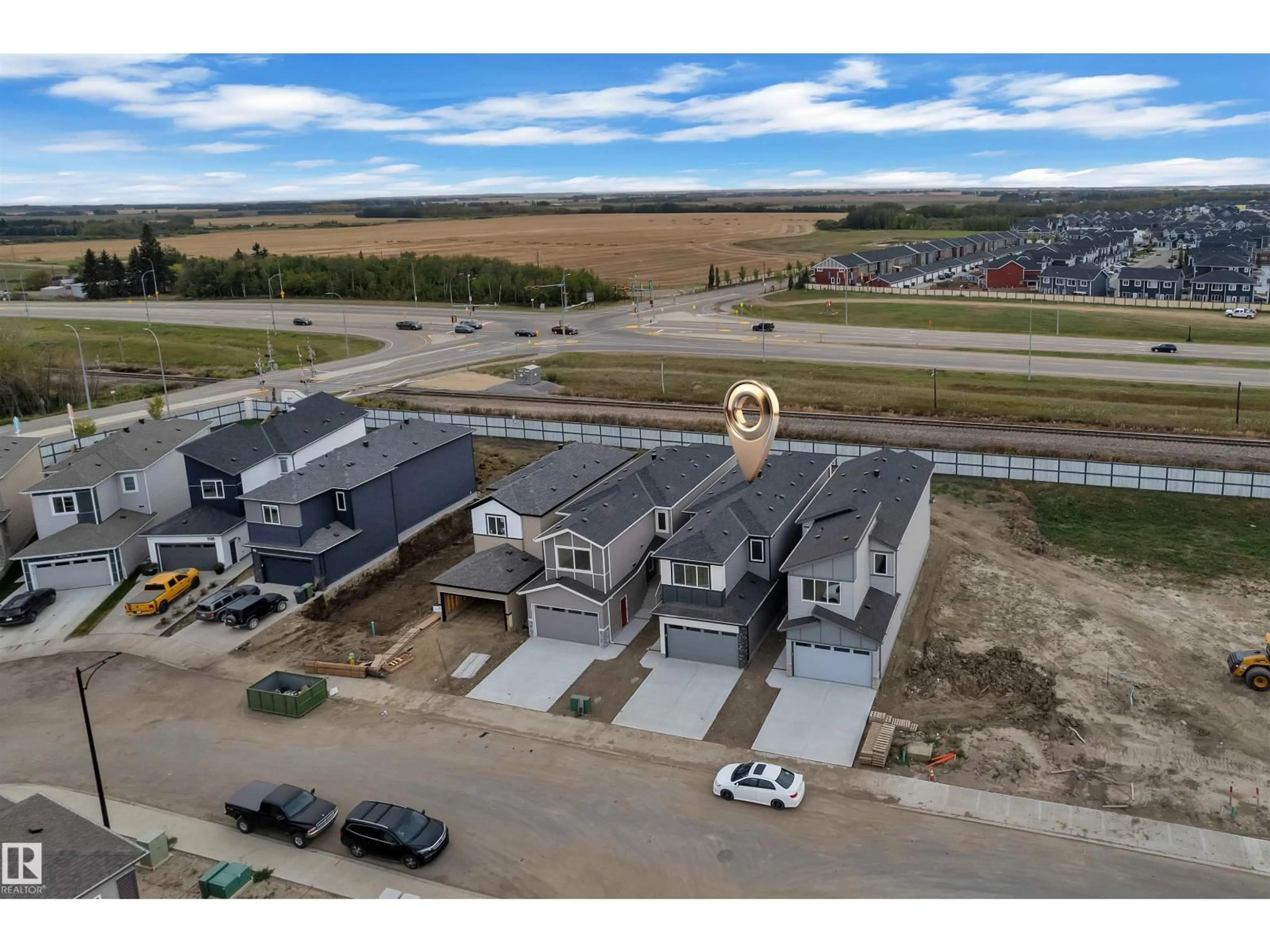 A pic from outside/outdoor area/front of a property/back of a property/a pic from drone, building for 188 MUNN WY, Leduc Alberta T9E0S9