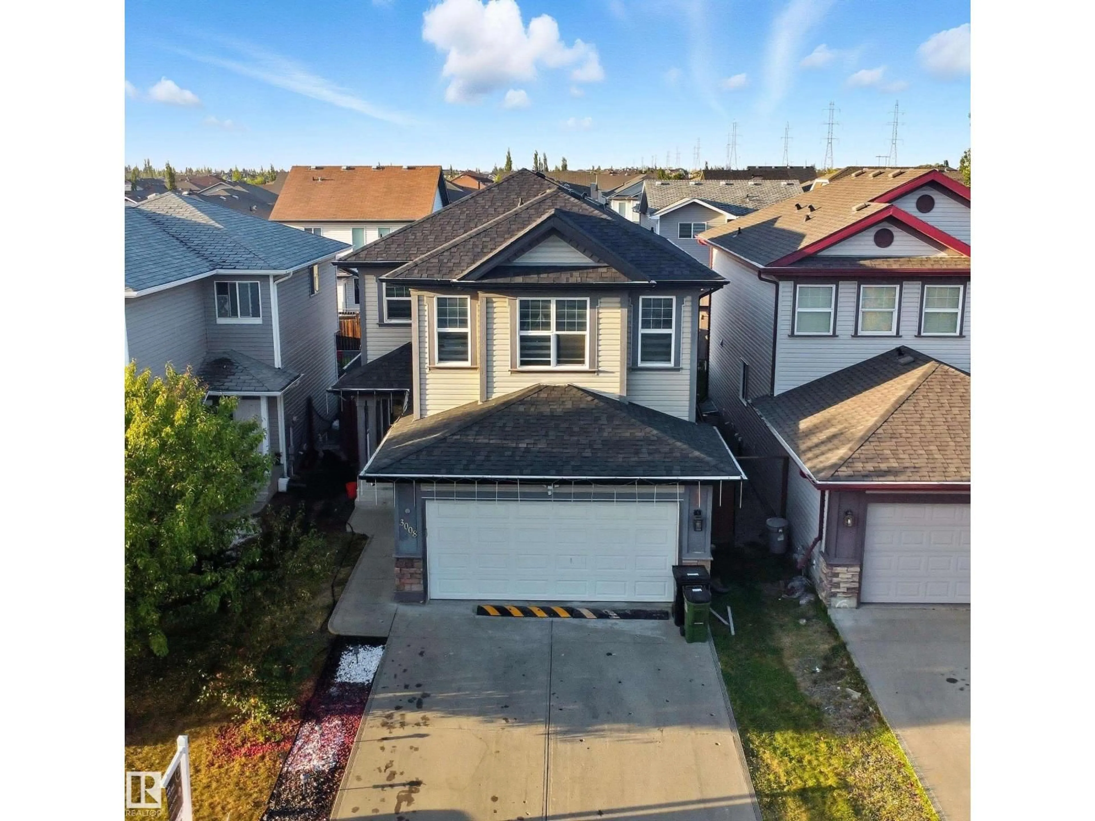 A pic from outside/outdoor area/front of a property/back of a property/a pic from drone, street for 3008 24 AV, Edmonton Alberta T6T0G7