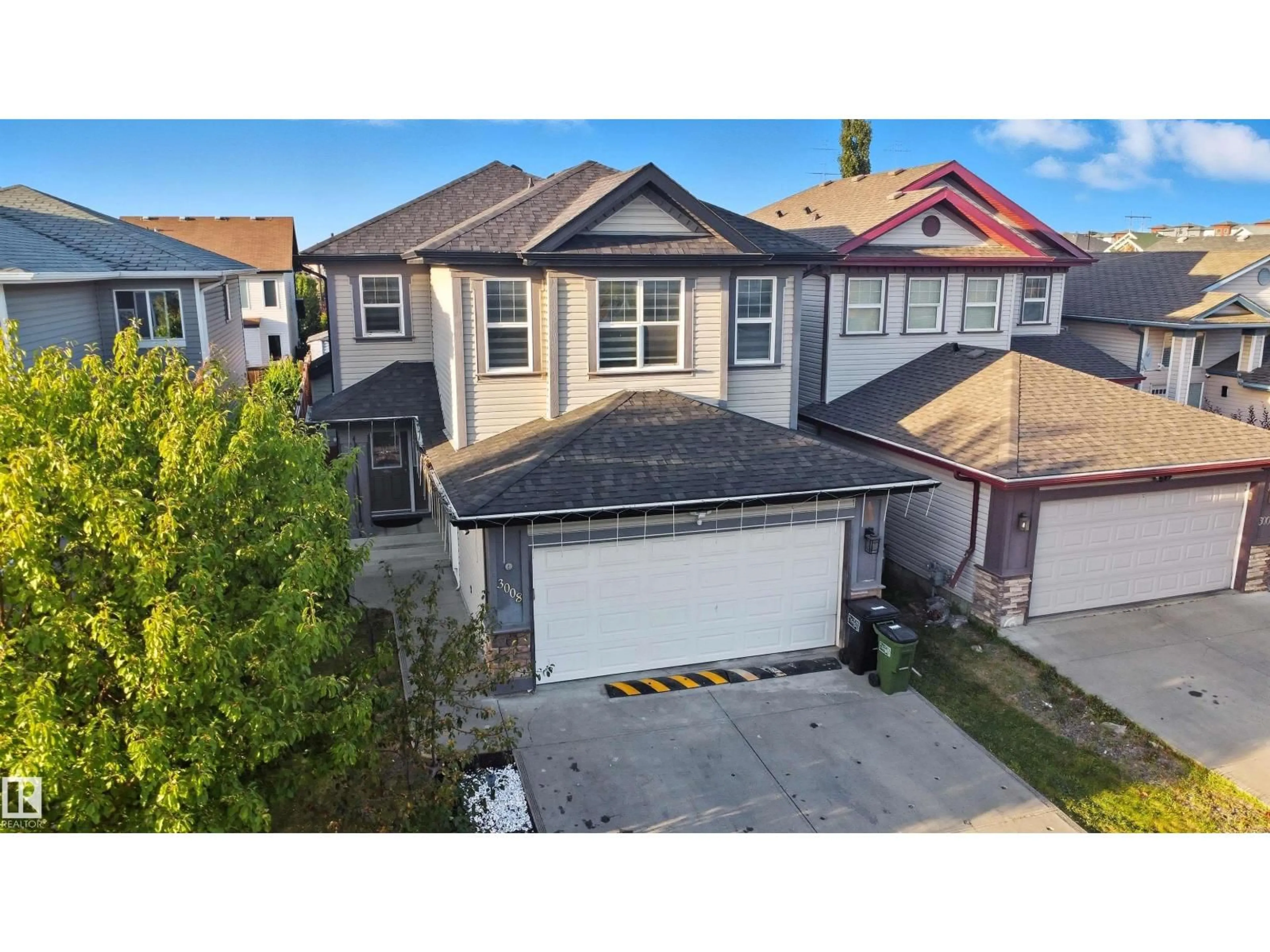 A pic from outside/outdoor area/front of a property/back of a property/a pic from drone, street for 3008 24 AV, Edmonton Alberta T6T0G7
