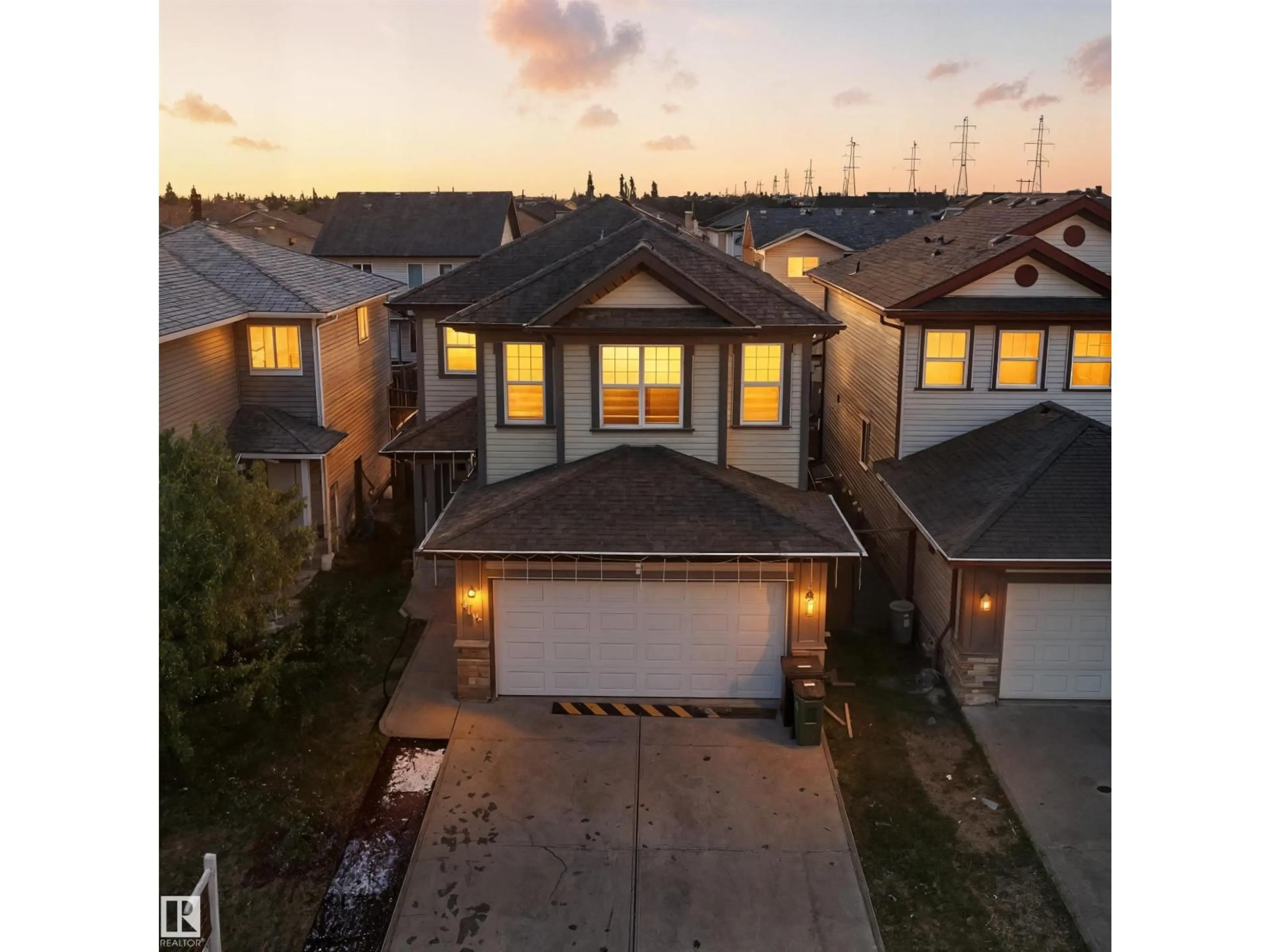 A pic from outside/outdoor area/front of a property/back of a property/a pic from drone, street for 3008 24 AV, Edmonton Alberta T6T0G7