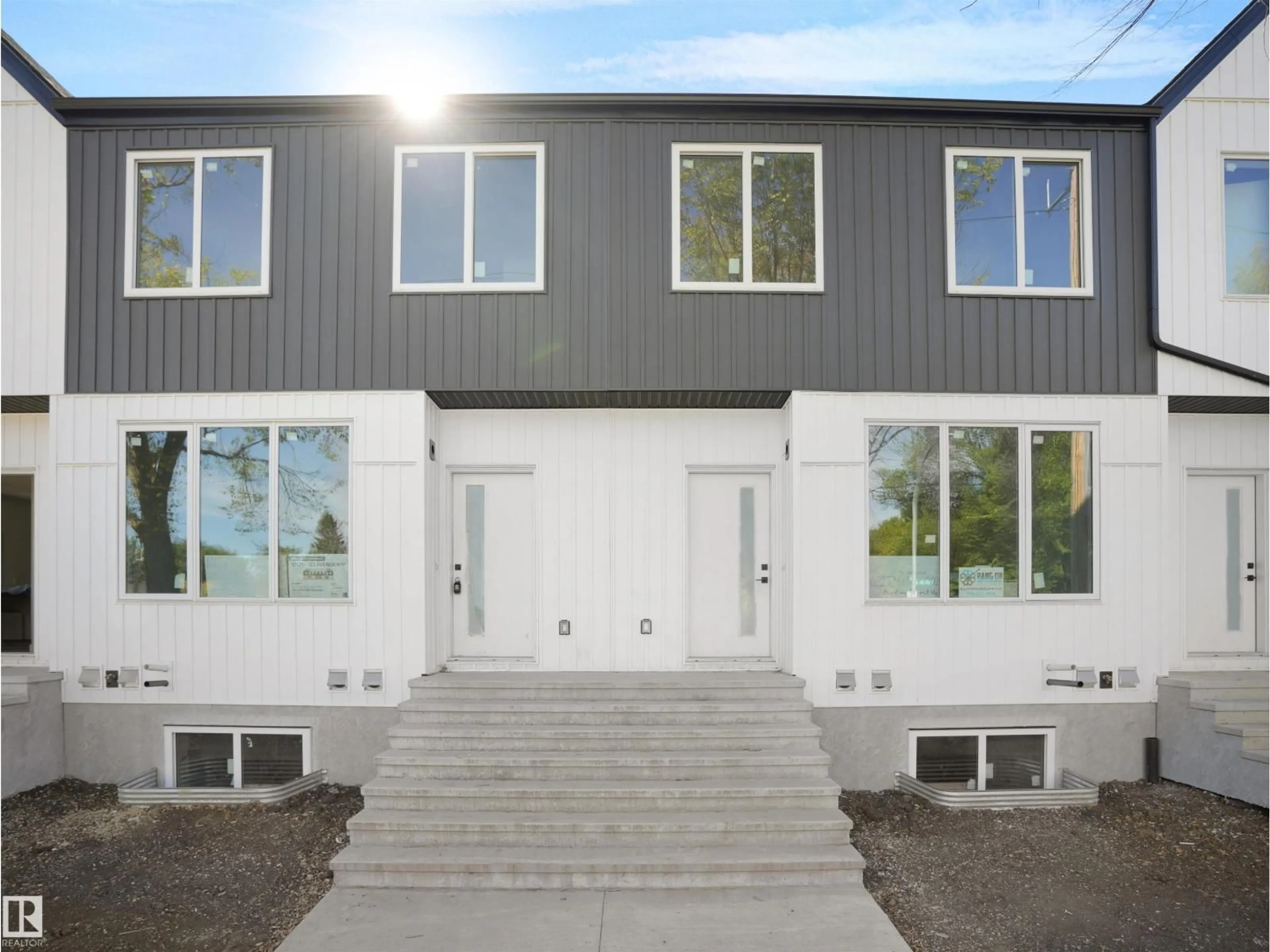 Home with vinyl exterior material, street for 10121 122 AV, Edmonton Alberta T5G2C3