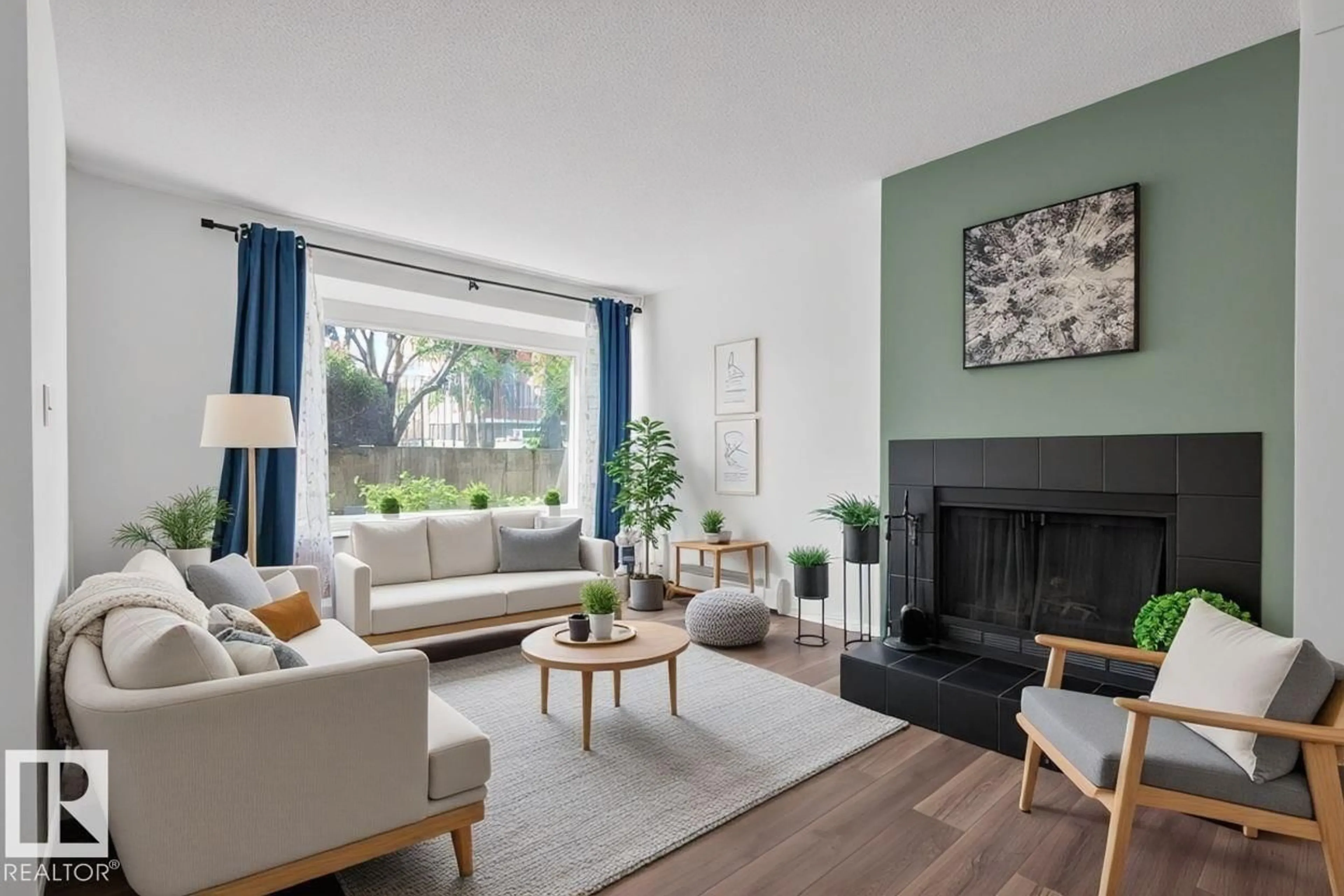 Living room with furniture, wood/laminate floor for NW - 10520 84 AV, Edmonton Alberta T6E2H4