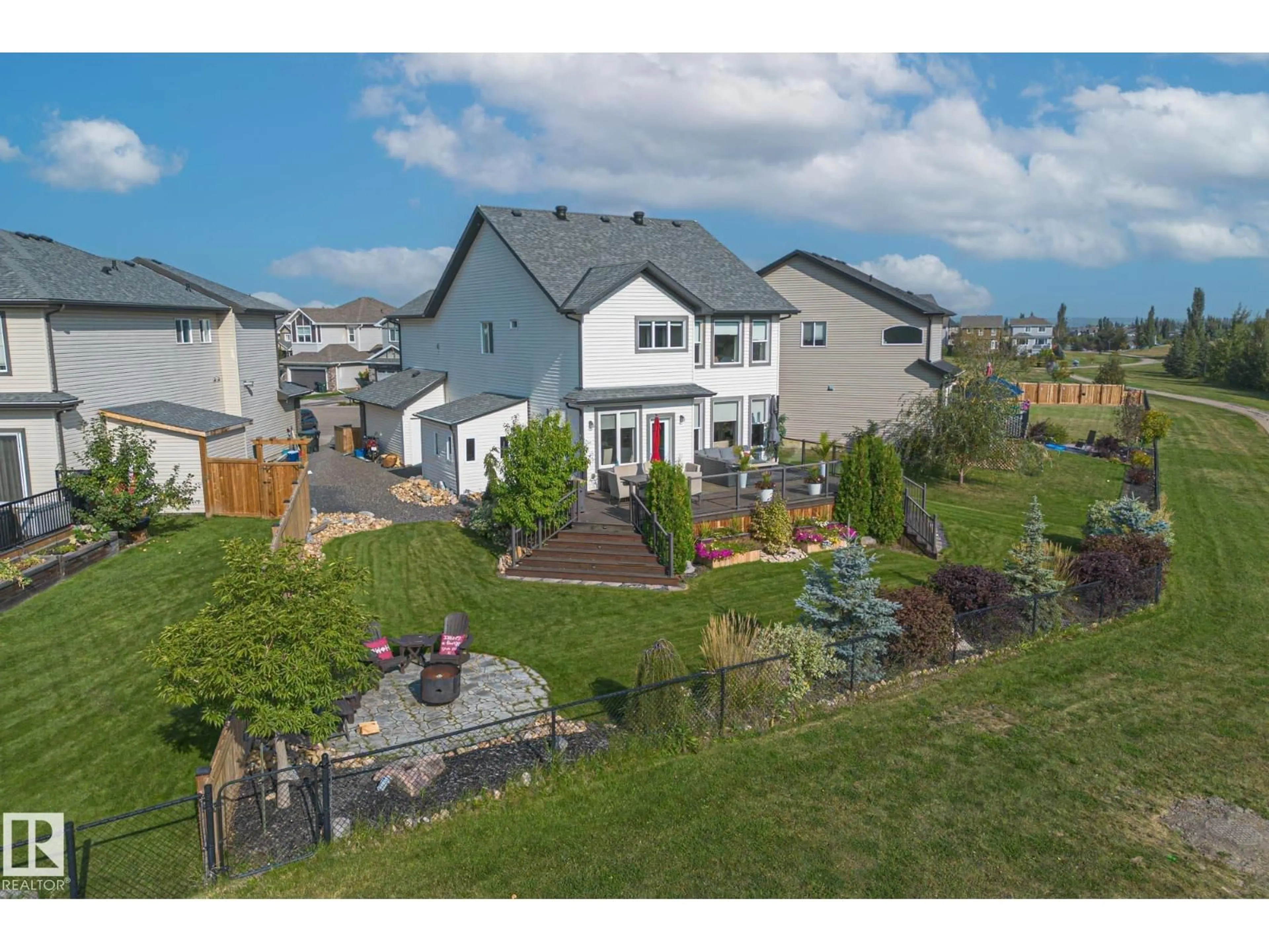 A pic from outside/outdoor area/front of a property/back of a property/a pic from drone, mountain view for 10 MEADOWLAND GD, Spruce Grove Alberta T7X0N3
