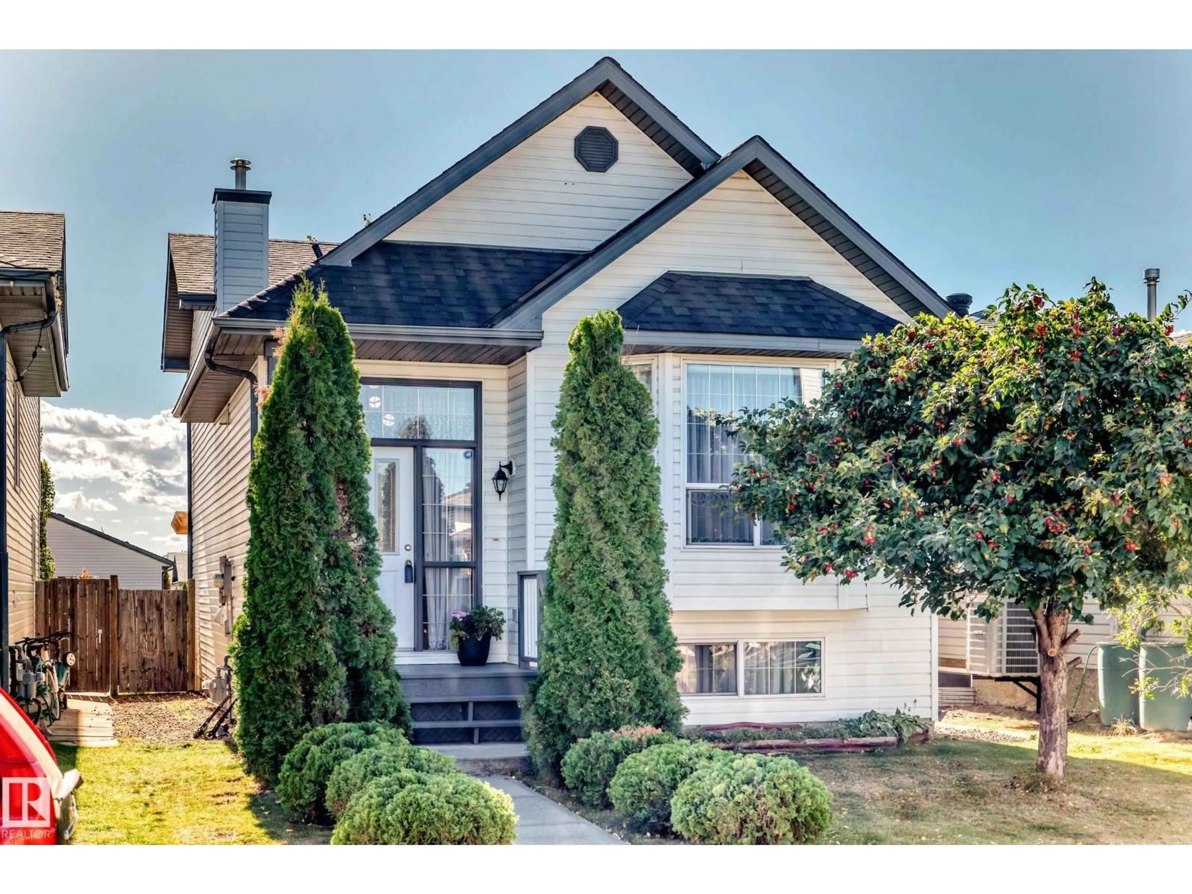 Home with brick exterior material, street for 2115 36 AV, Edmonton Alberta T6T1S3