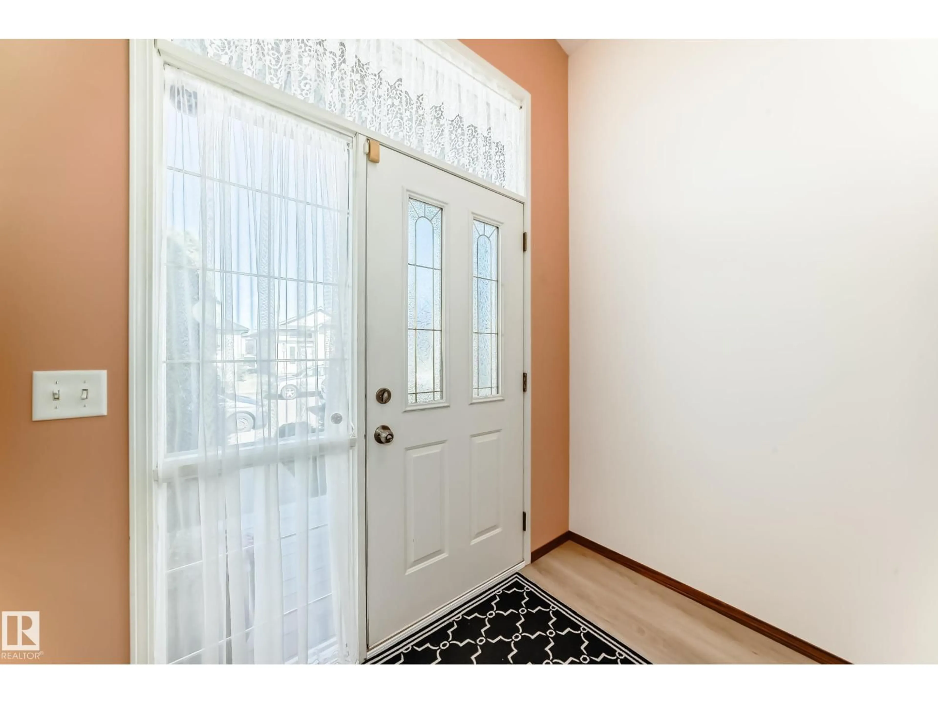 Indoor entryway for 2115 36 AV, Edmonton Alberta T6T1S3