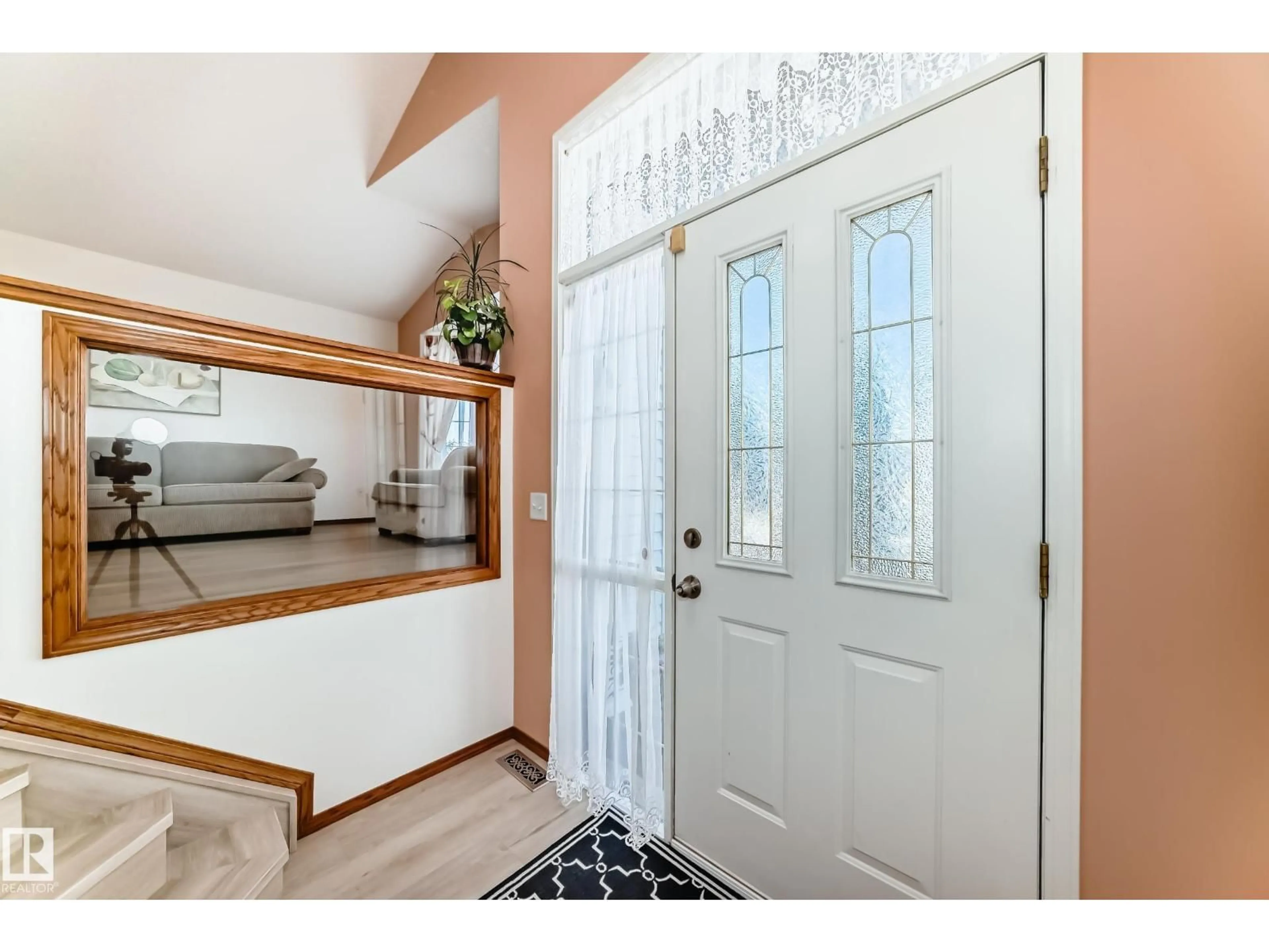 Indoor entryway for 2115 36 AV, Edmonton Alberta T6T1S3