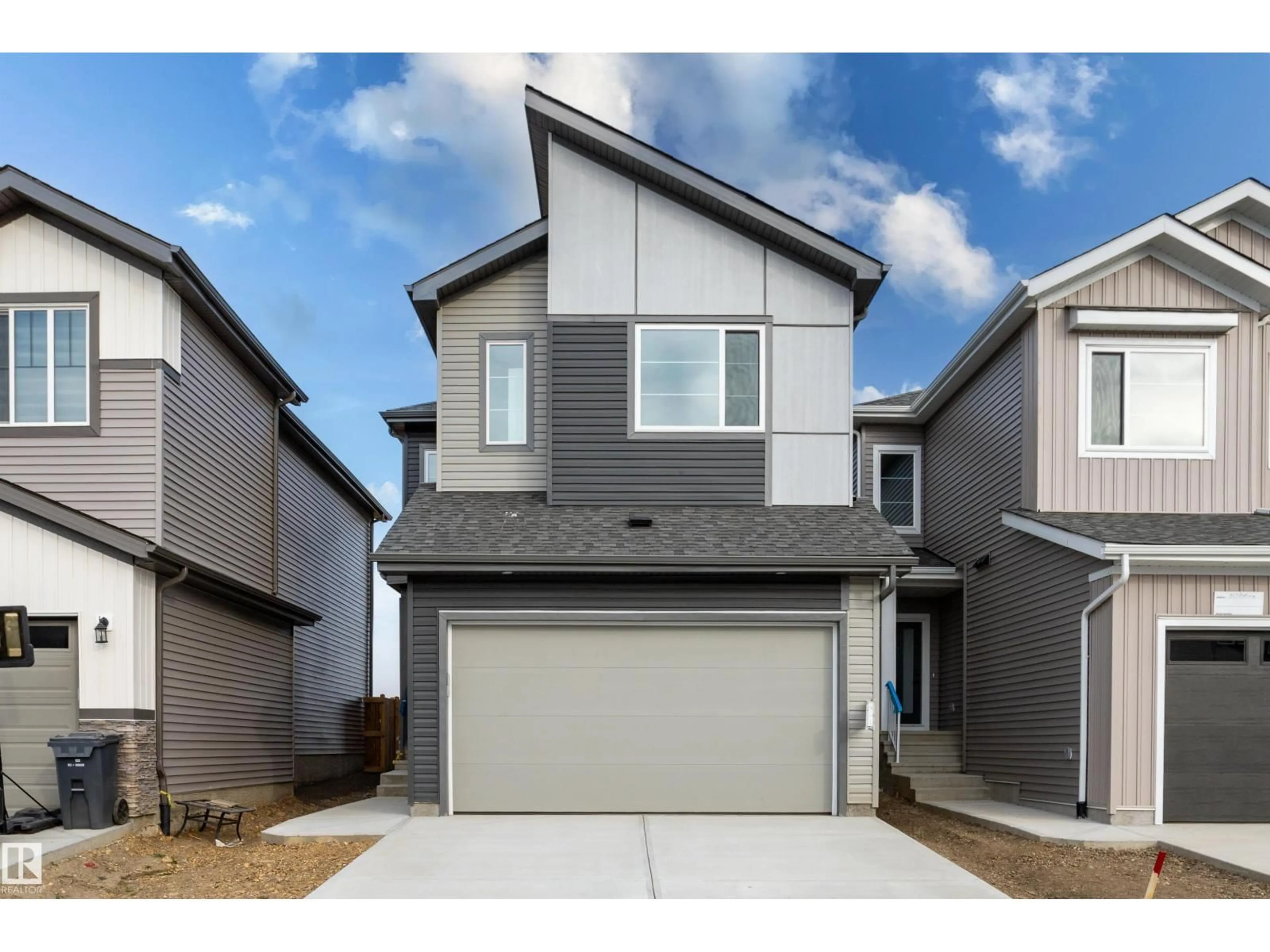 Home with vinyl exterior material, street for 325 BLUFF CV, Leduc Alberta T9E1R5