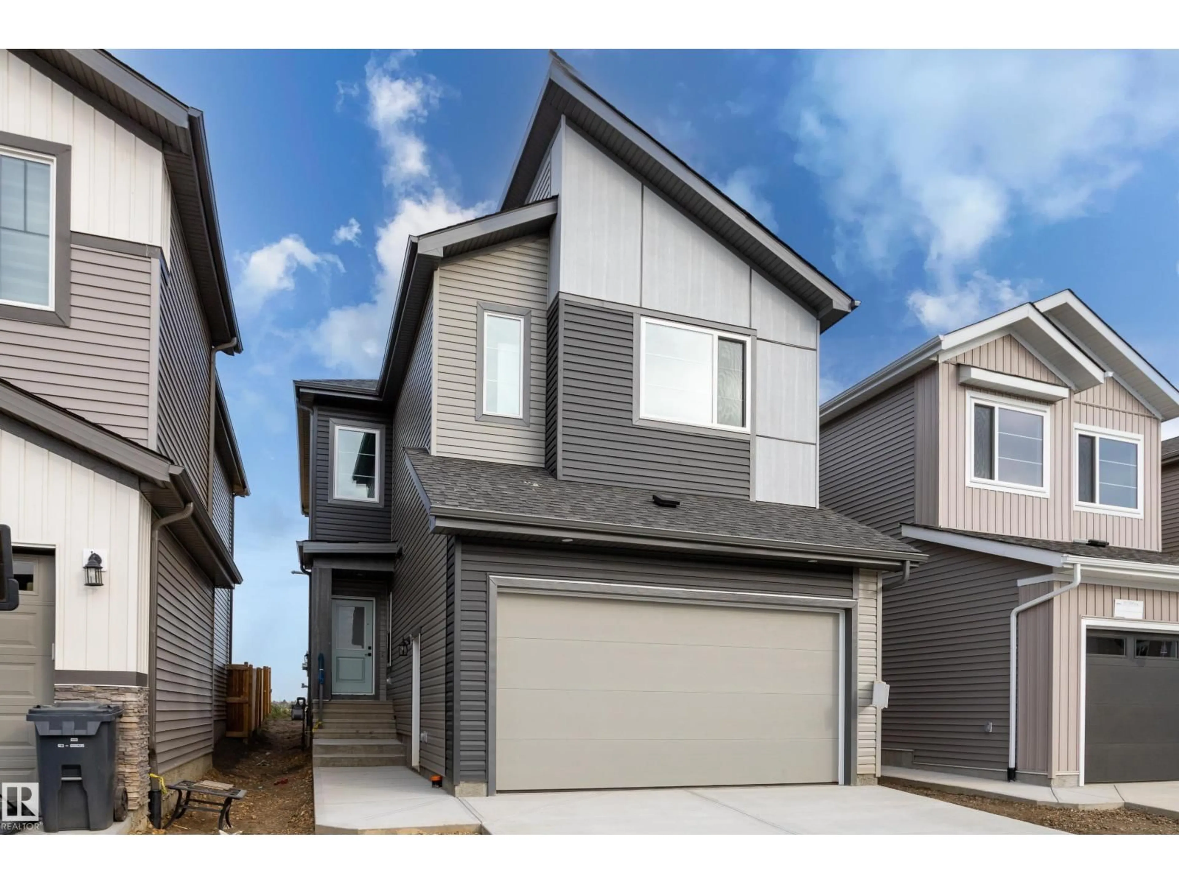 Home with vinyl exterior material, street for 325 BLUFF CV, Leduc Alberta T9E1R5