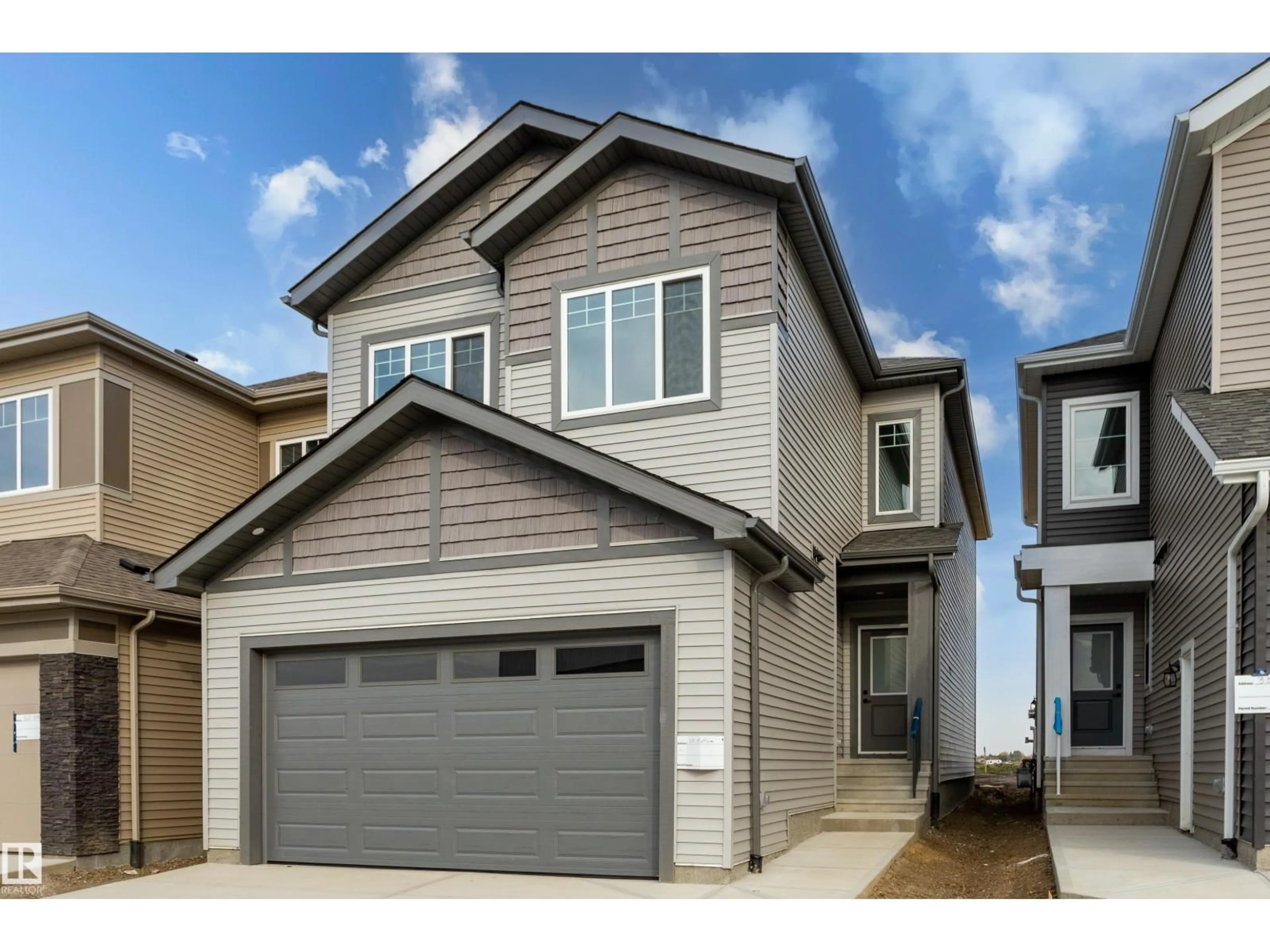 Home with vinyl exterior material, street for 331 BLUFF CV, Leduc Alberta T9E1R5