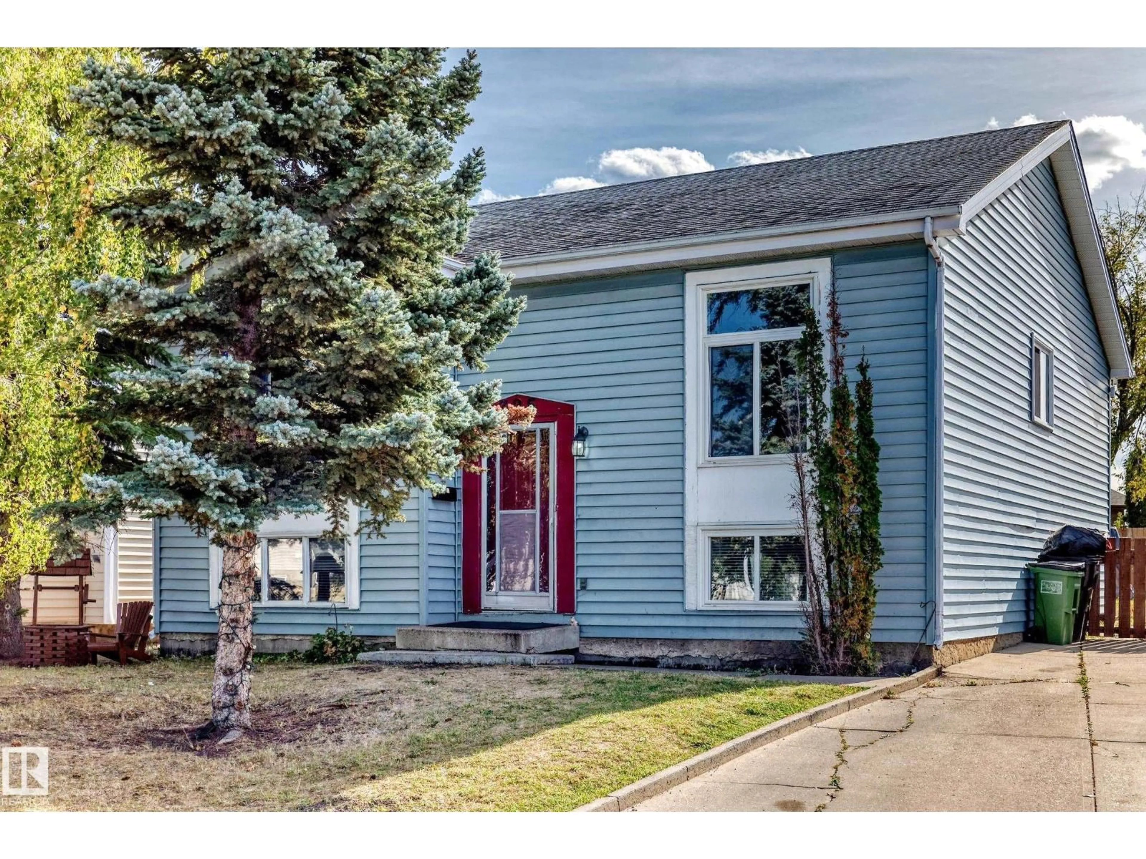 Home with vinyl exterior material, street for 325 WARWICK RD, Edmonton Alberta T5X4R1