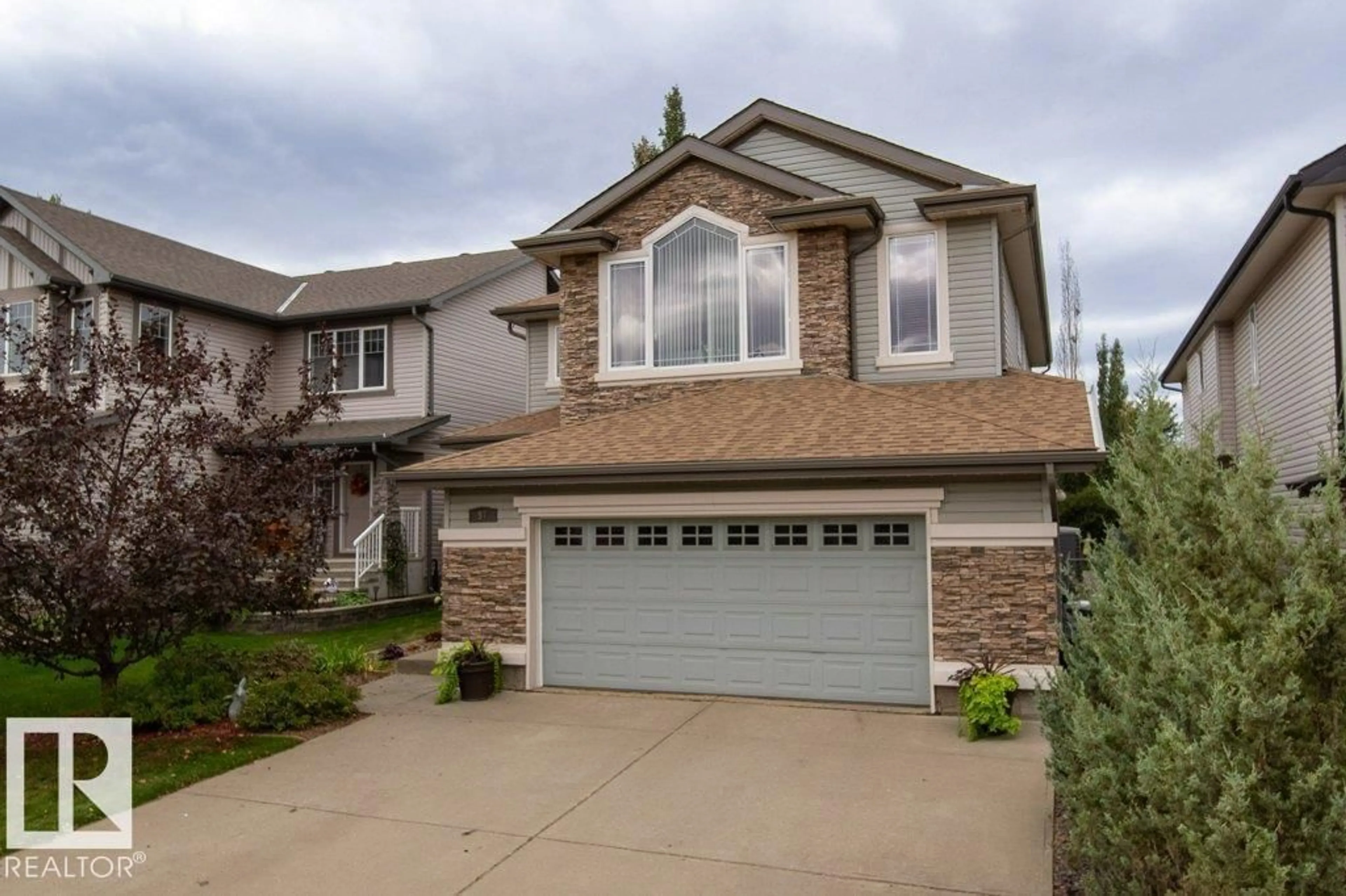 Home with vinyl exterior material, street for 97 CARLYLE CR, Sherwood Park Alberta T8H2T8