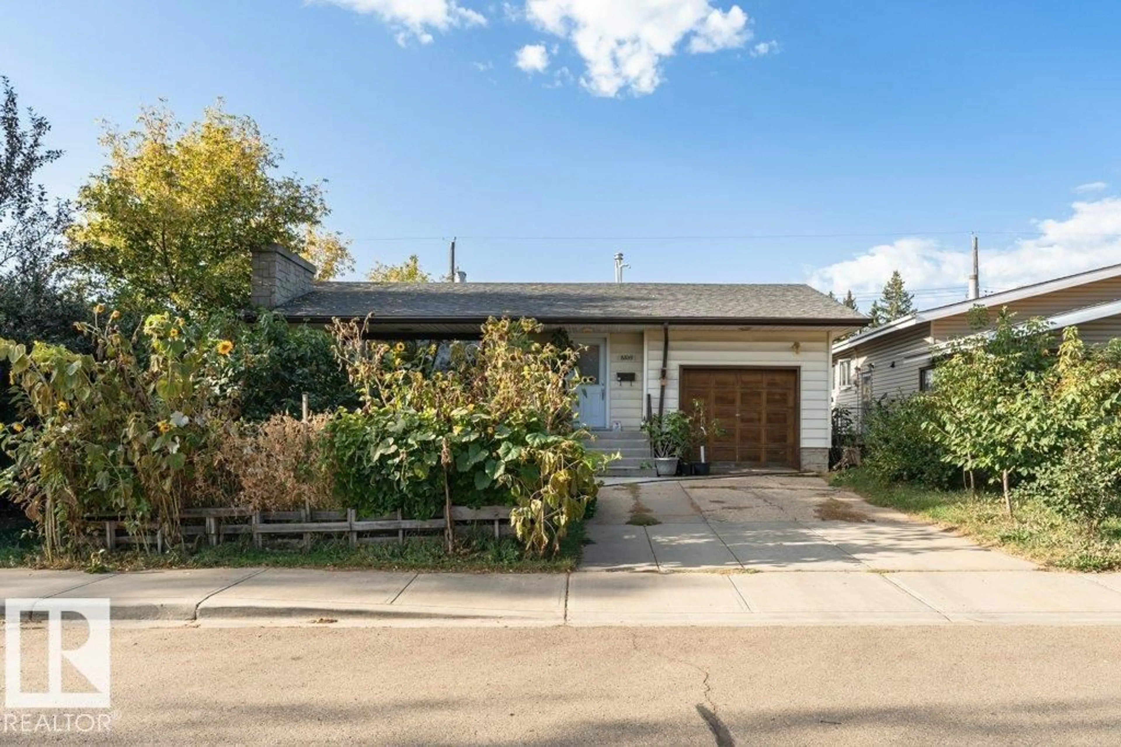 Home with brick exterior material, street for 8539 CONNORS RD, Edmonton Alberta T6C4H2