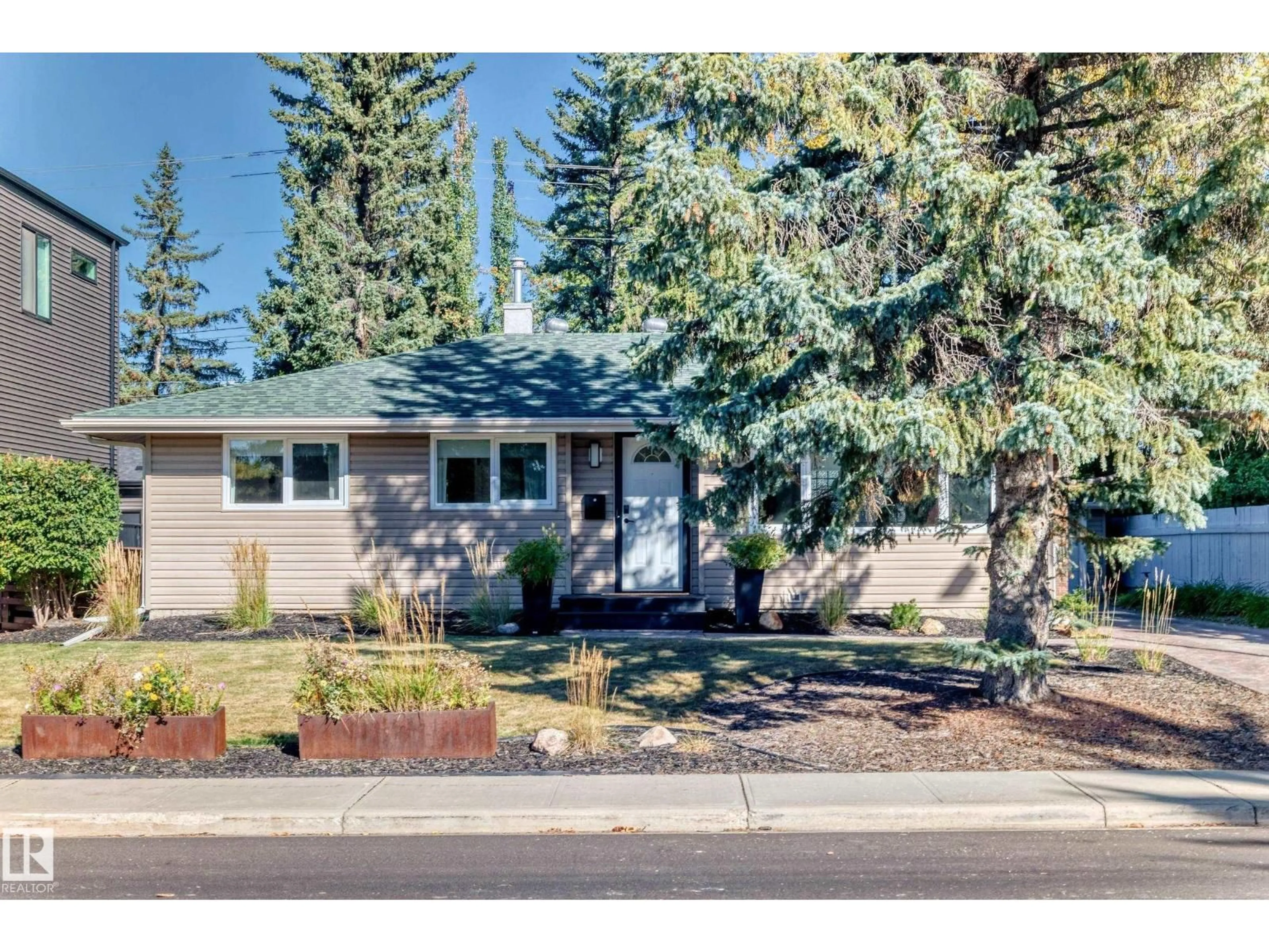 Home with vinyl exterior material, street for NW - 14608 80 AV, Edmonton Alberta T5R3K6