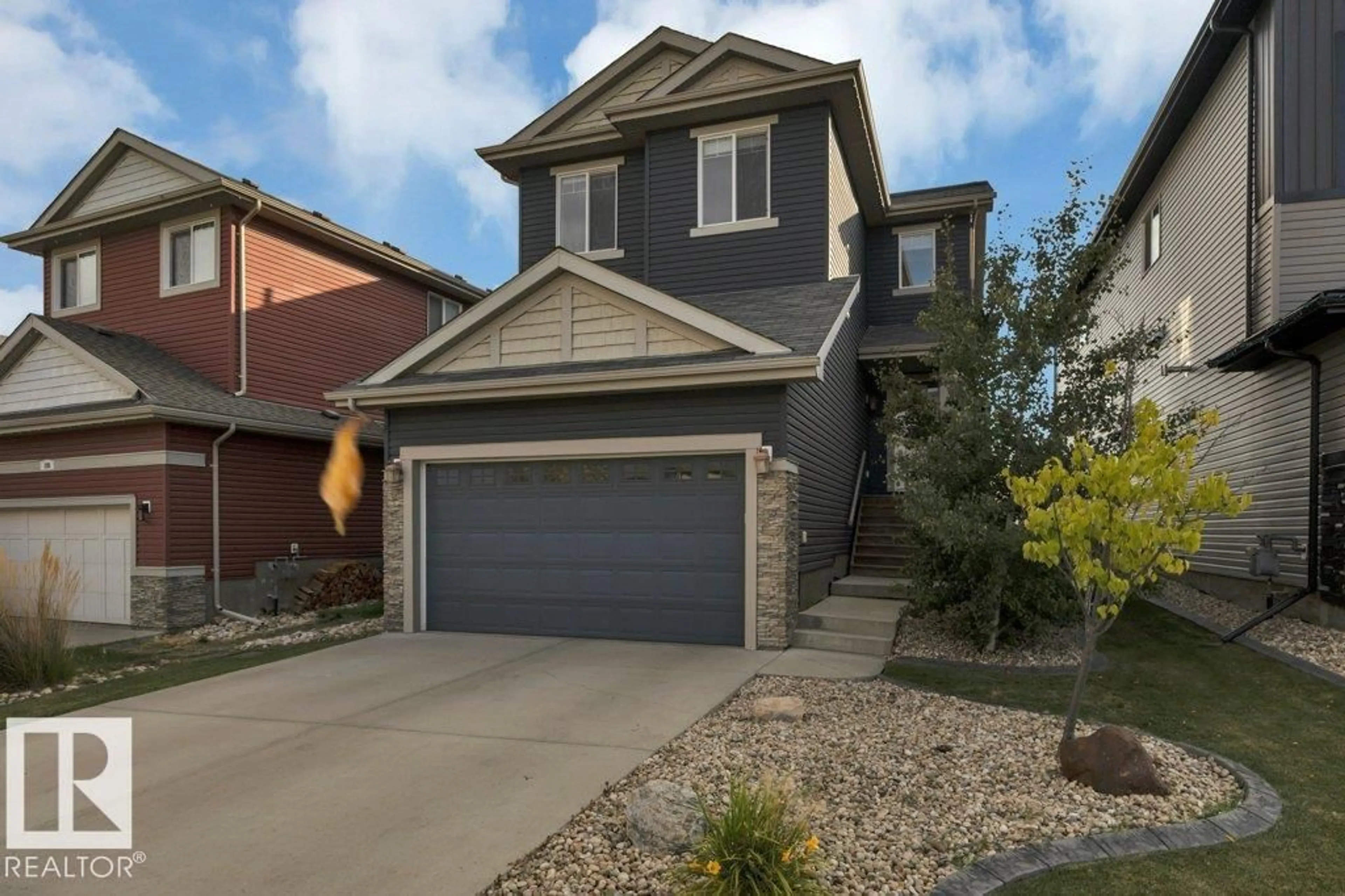 Home with vinyl exterior material, street for 198 MEADOWVIEW DR, Leduc Alberta T9E1A4
