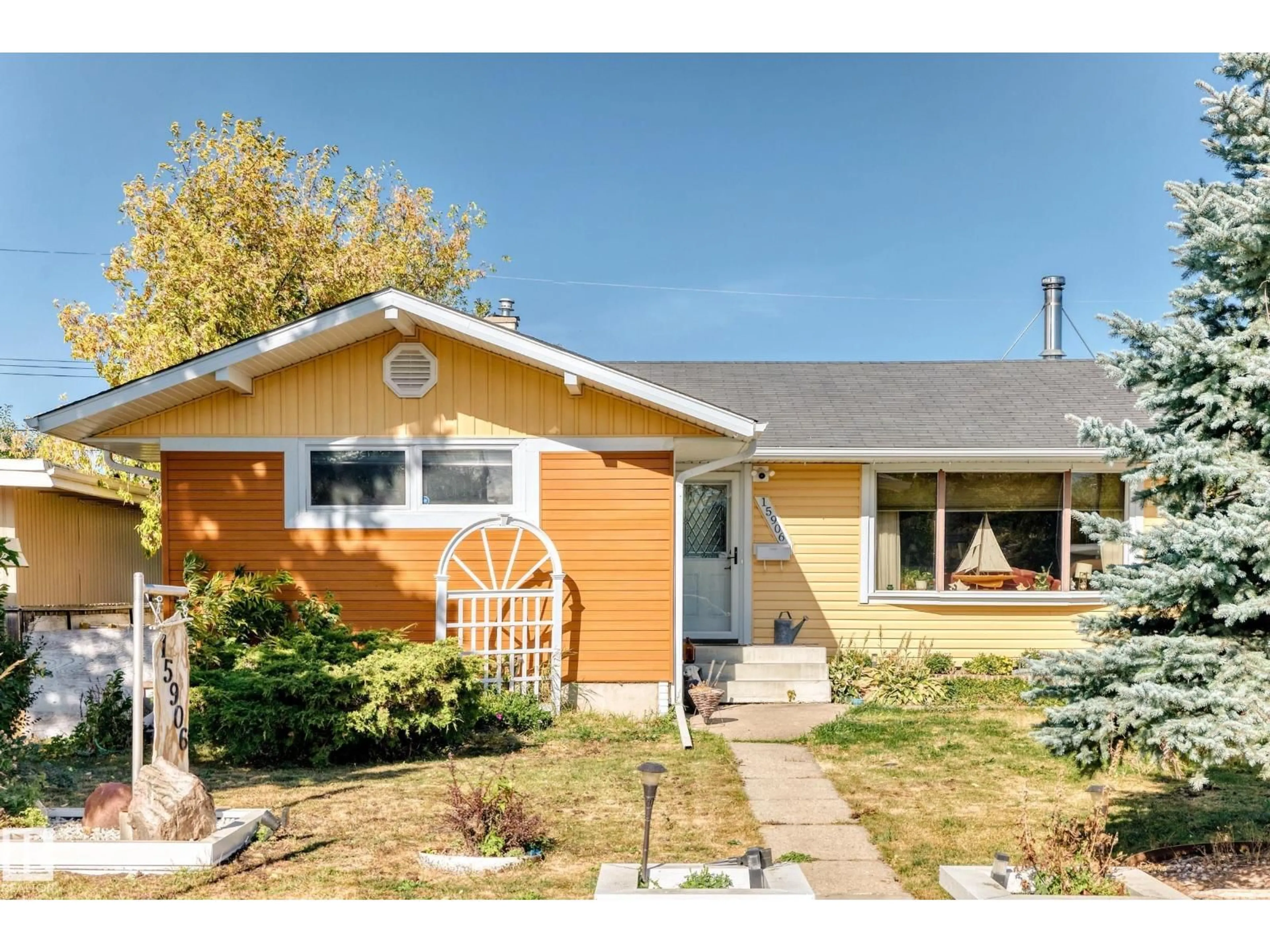 Home with vinyl exterior material, street for 15906 92A AV, Edmonton Alberta T5R5G3