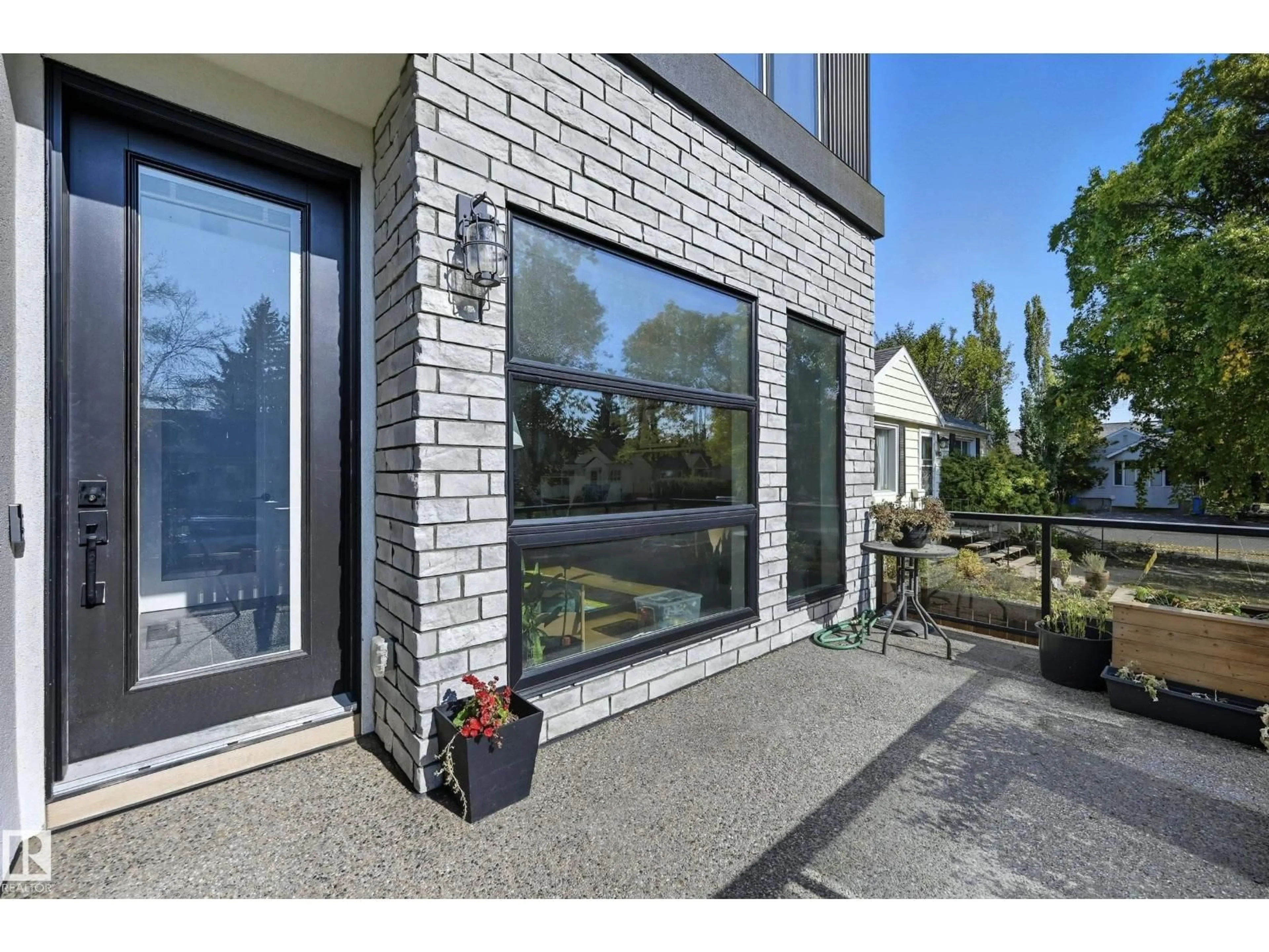 Home with brick exterior material, street for 8806 85 AV, Edmonton Alberta T6C1G9