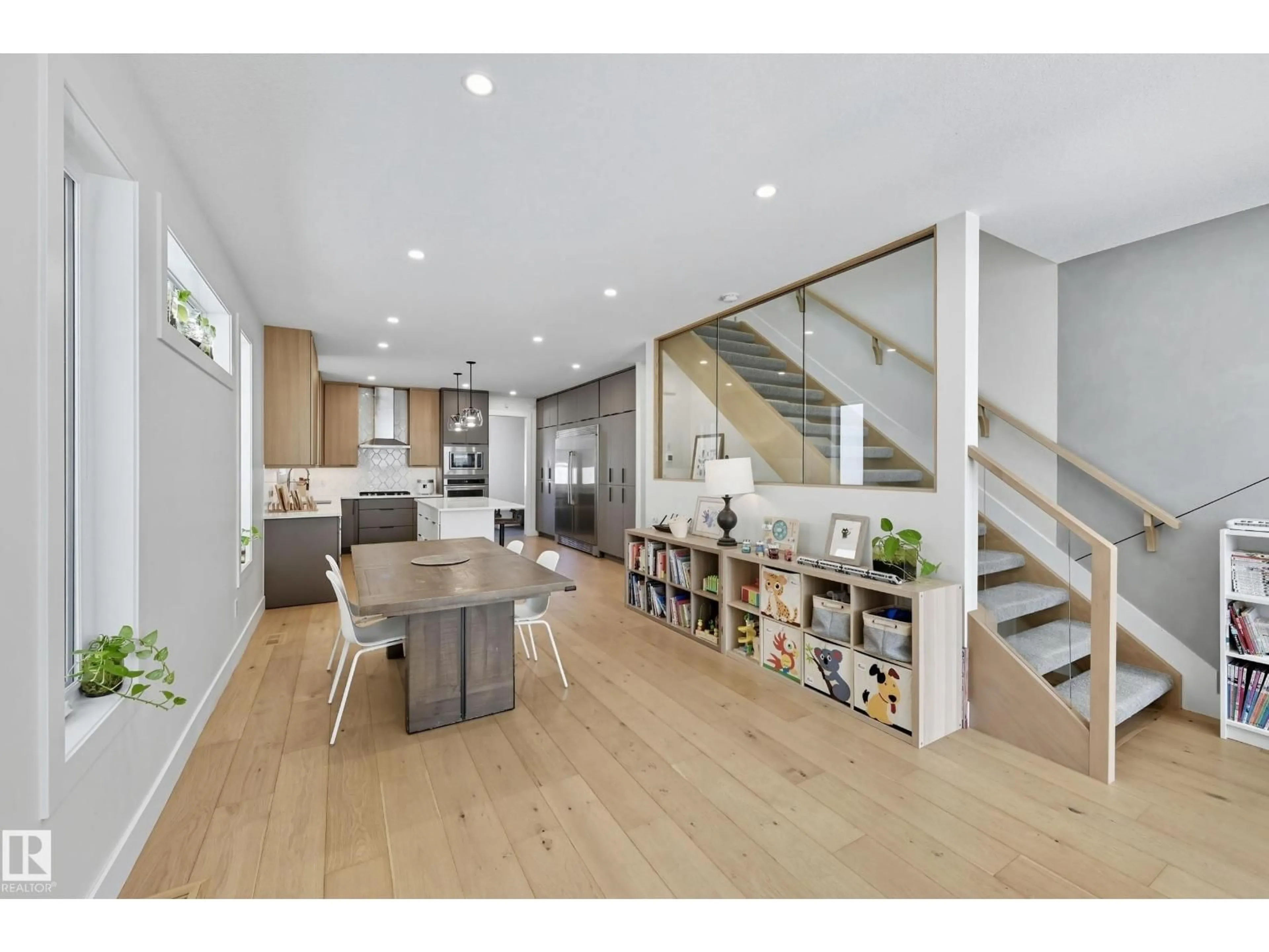 Open concept kitchen, wood/laminate floor for 8806 85 AV, Edmonton Alberta T6C1G9