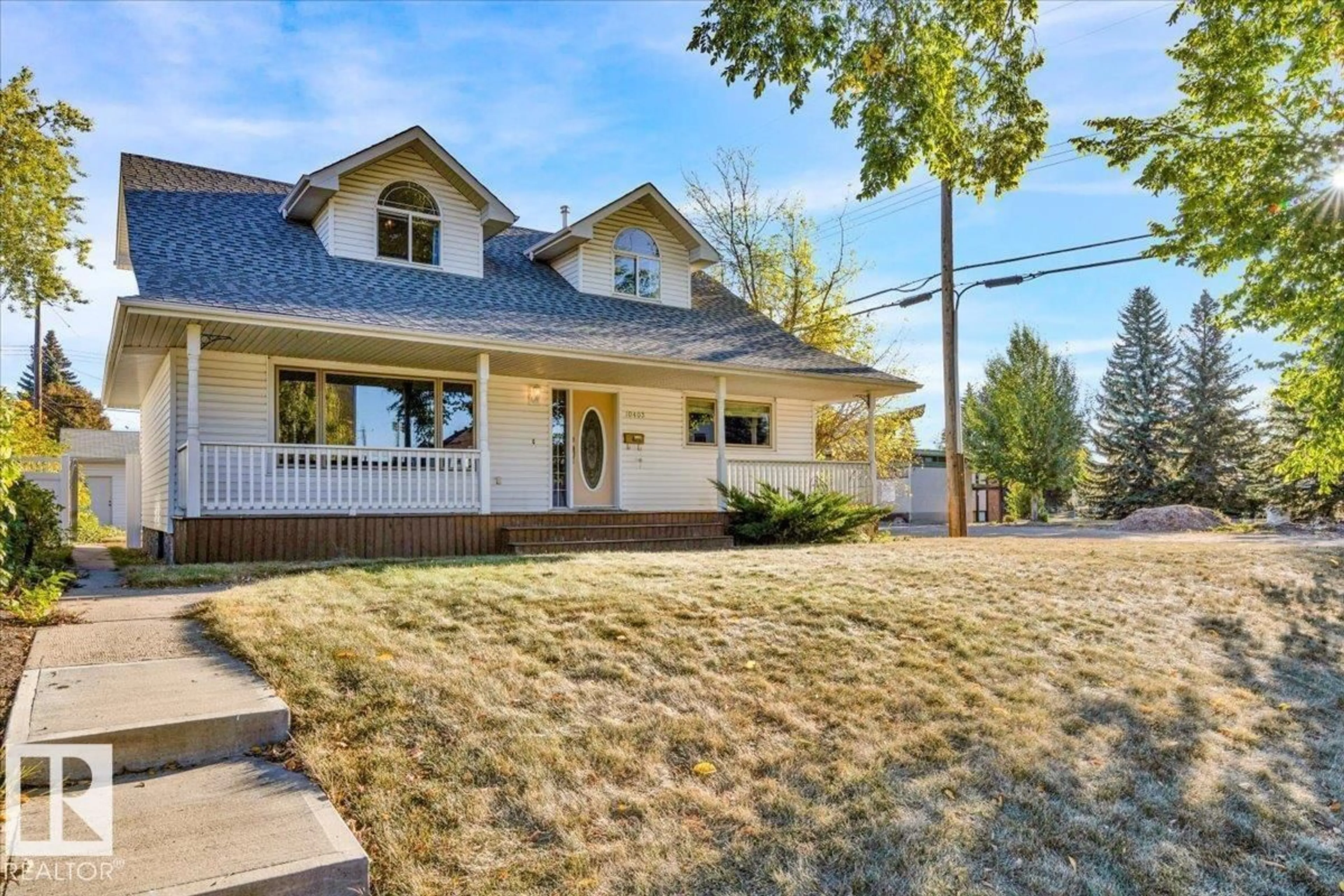 Home with vinyl exterior material, street for 10403 62 ST NW, Edmonton Alberta T6A2M2