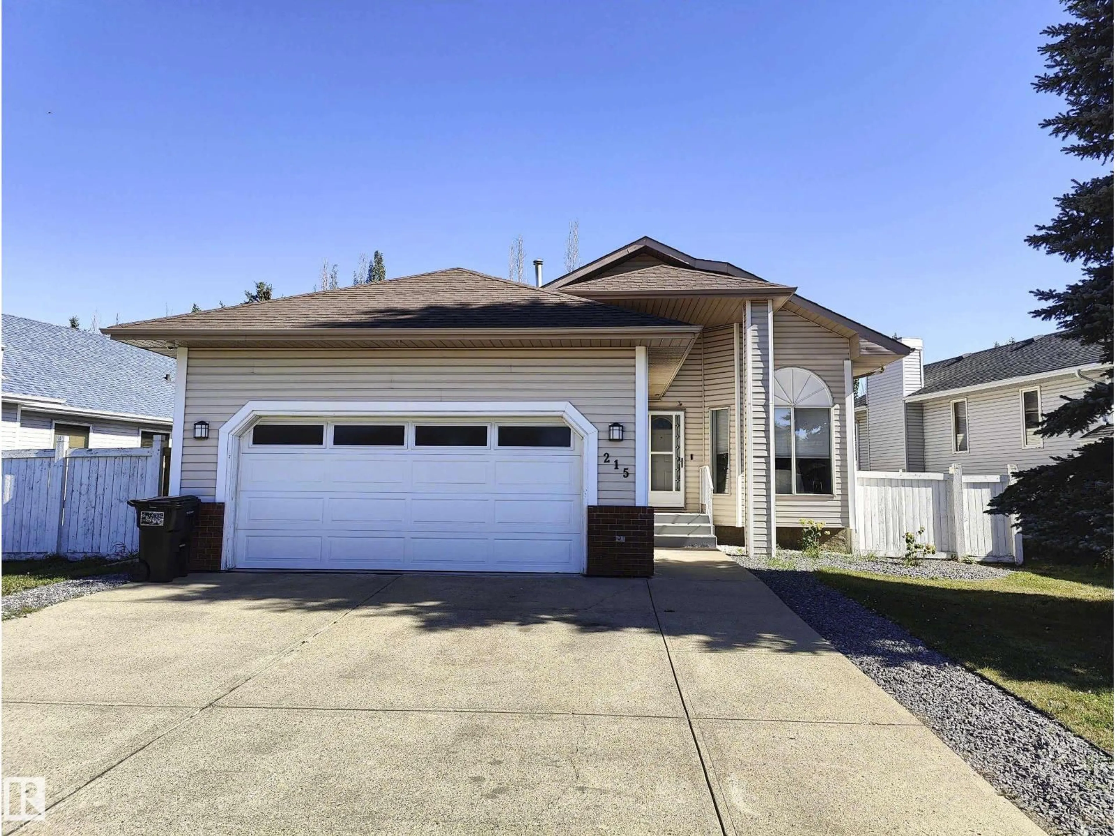 Home with vinyl exterior material, street for 215 PETER CL NW, Edmonton Alberta T5T5Y5