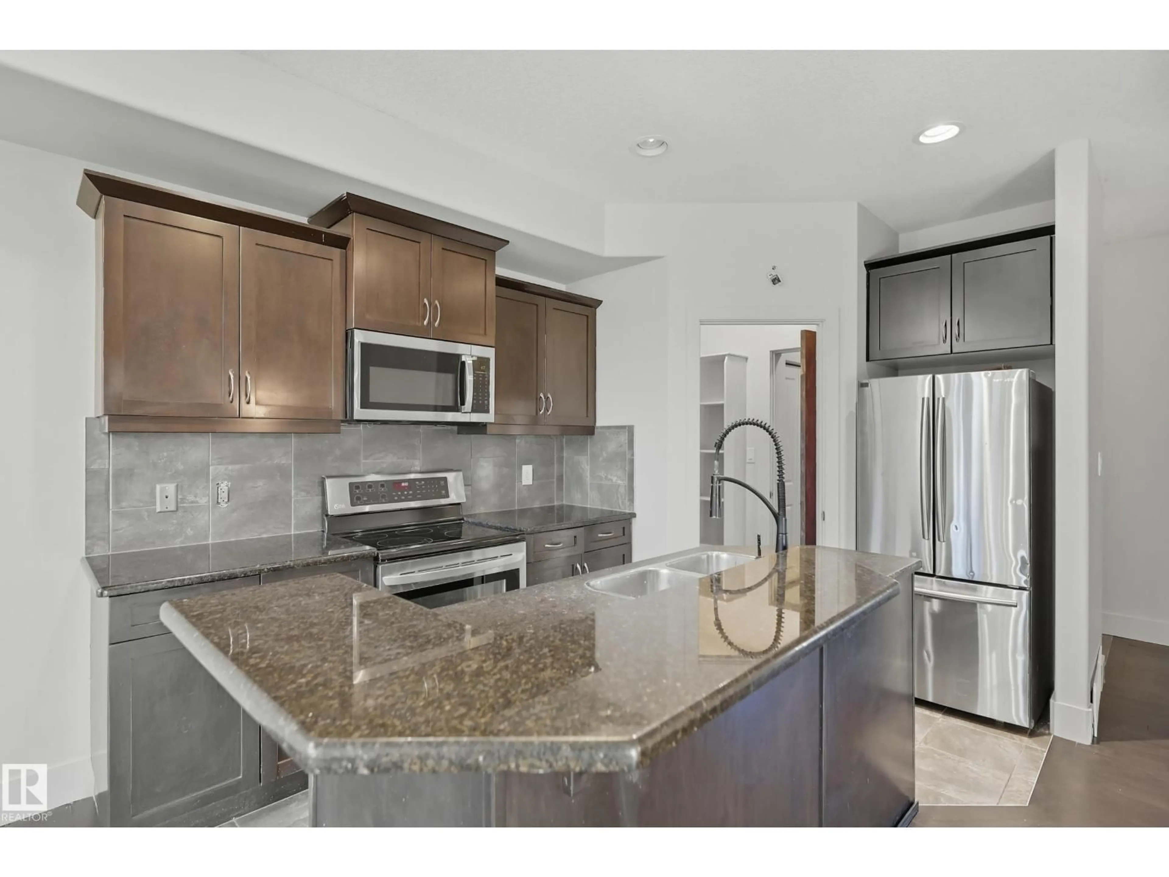 Open concept kitchen, ceramic/tile floor for #29 - 1901 126 ST, Edmonton Alberta T6W0A5