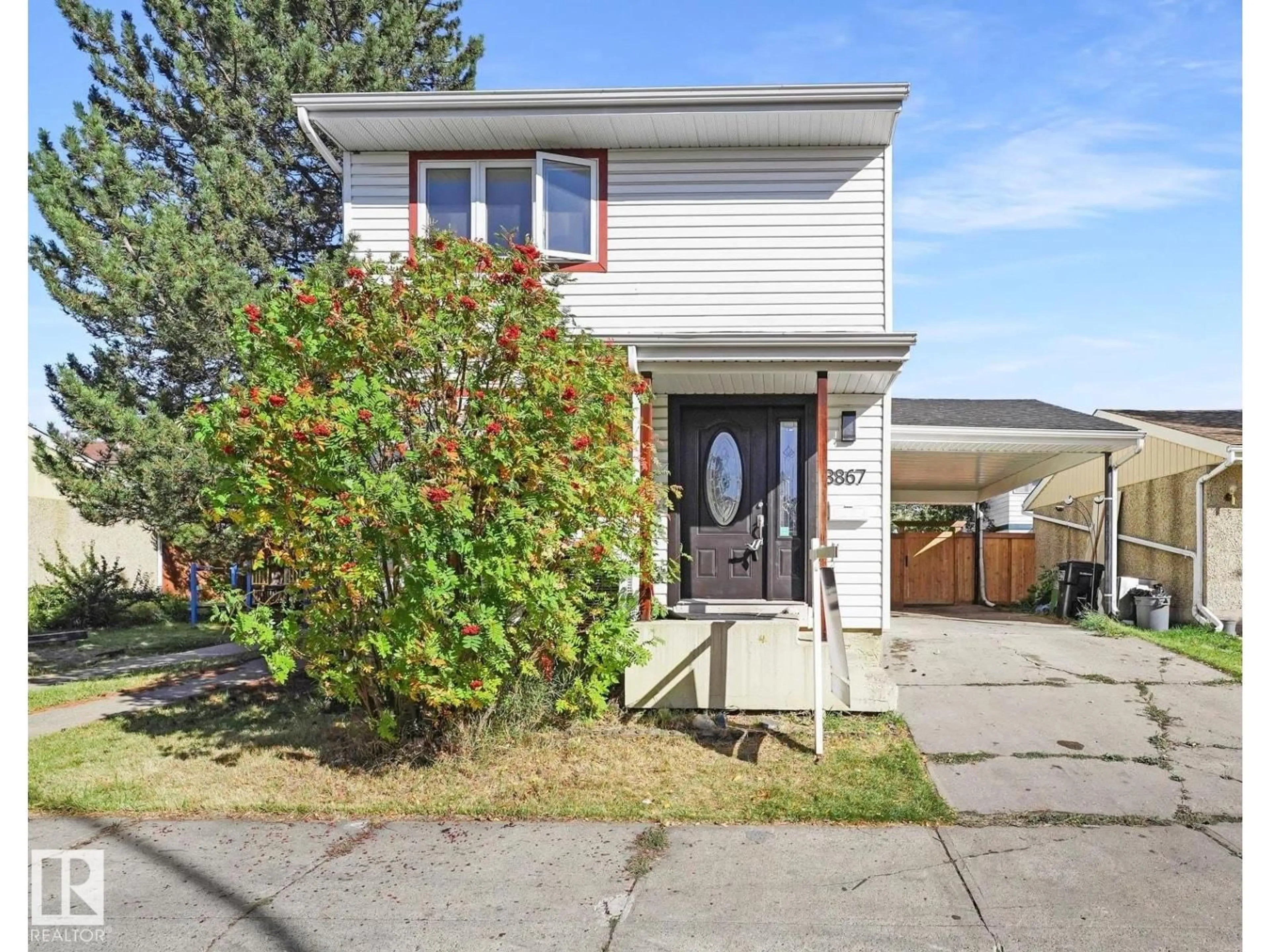 Home with vinyl exterior material, street for 3867 85 ST, Edmonton Alberta T6K2L5